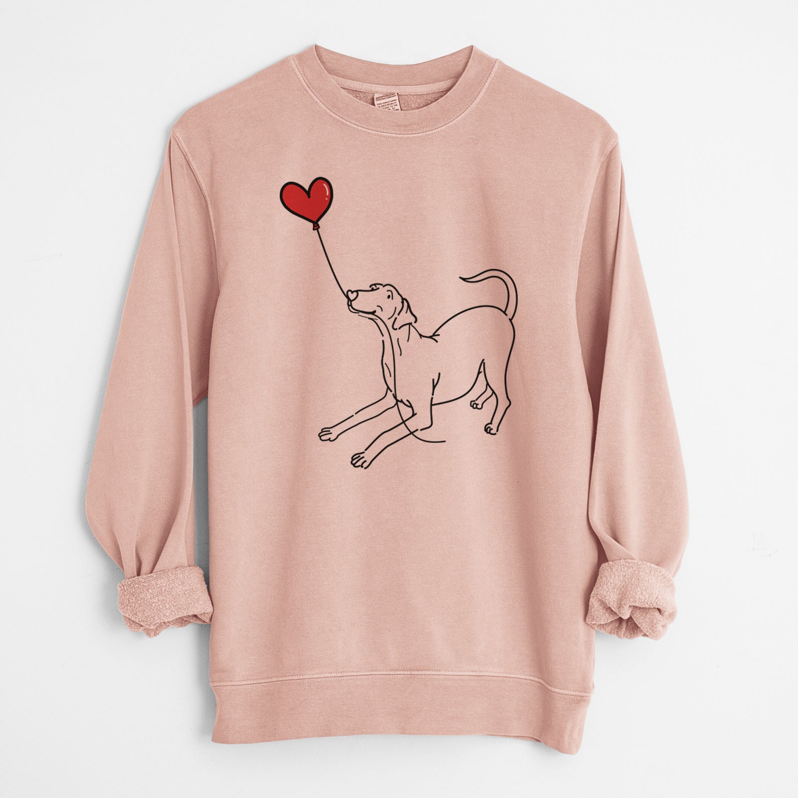 Minimalist line drawing of a Doberman Pinscher Heart String holding a heart balloon on a Dusty Pink Unisex pigment dyed crew sweatshirt