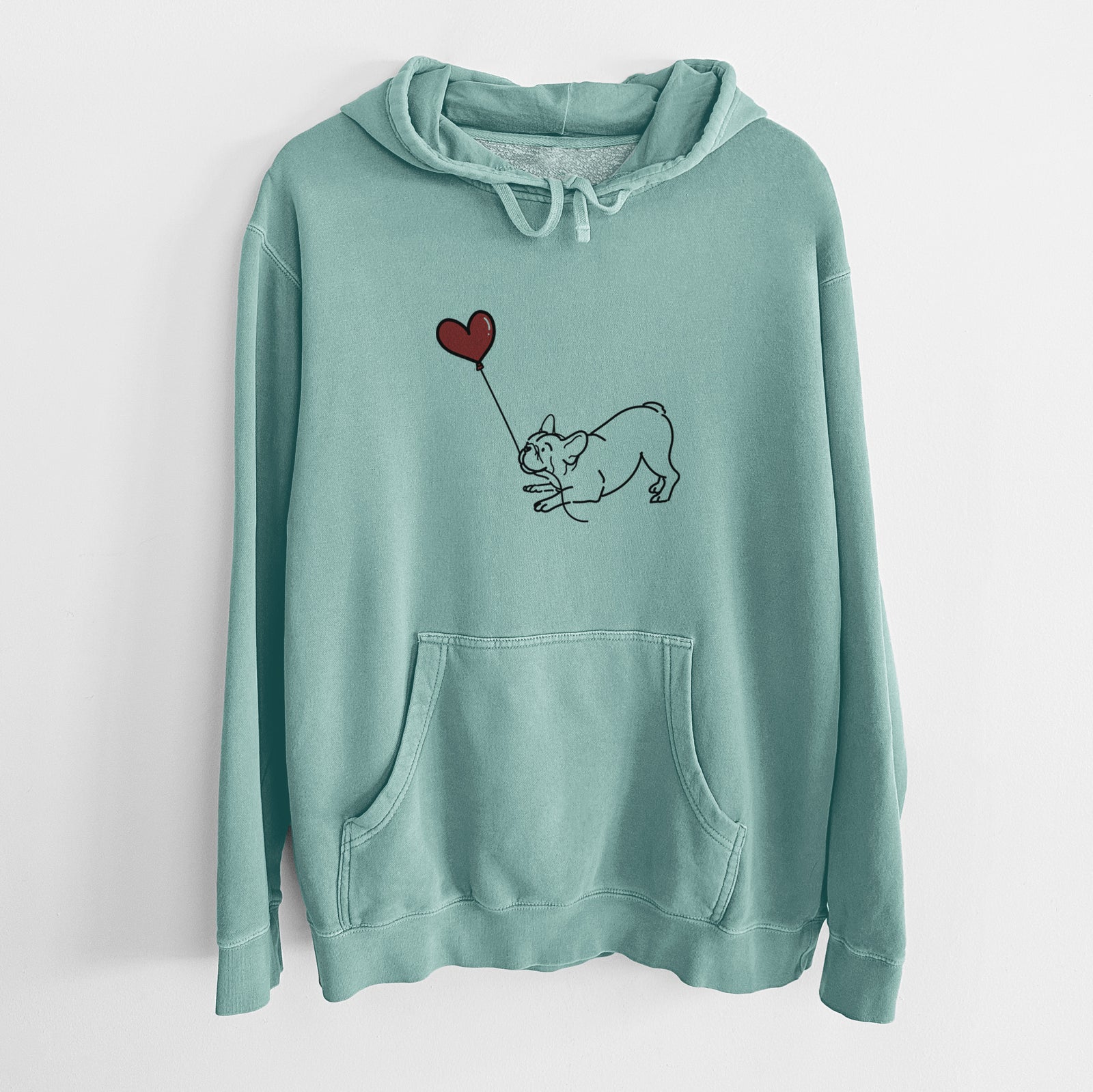 Minimalist line drawing of a Frenchie Heart String holding a heart balloon on a Mint Unisex pigment dyed hoodie