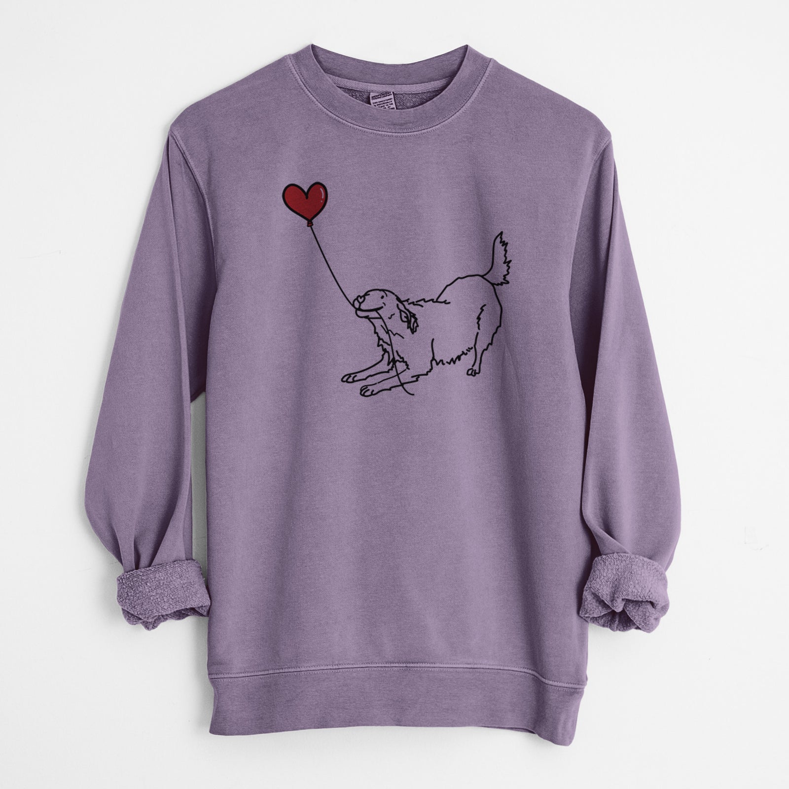 Minimalist line drawing of a Golden Retriever Heart String holding a heart balloon on a Plum Unisex pigment dyed crew sweatshirt