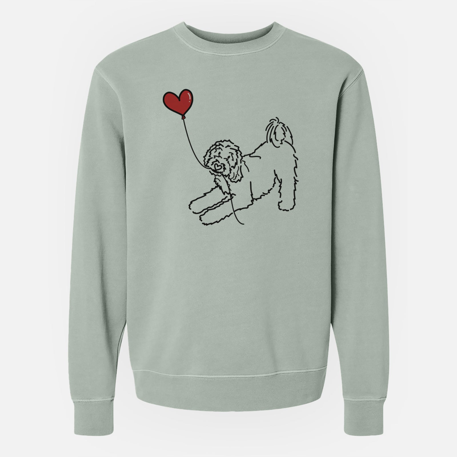 Minimalist line drawing of a Goldendoodle Heart String holding a heart balloon on a Sage Unisex pigment dyed crew sweatshirt