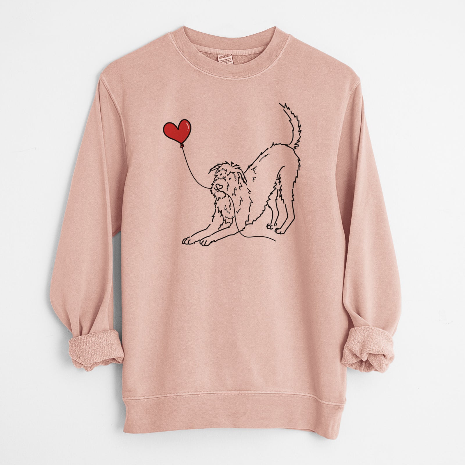 Minimalist line drawing of an Irish Wolfhound Heart String holding a heart balloon on a Dusty Pink Unisex pigment dyed crew sweatshirt