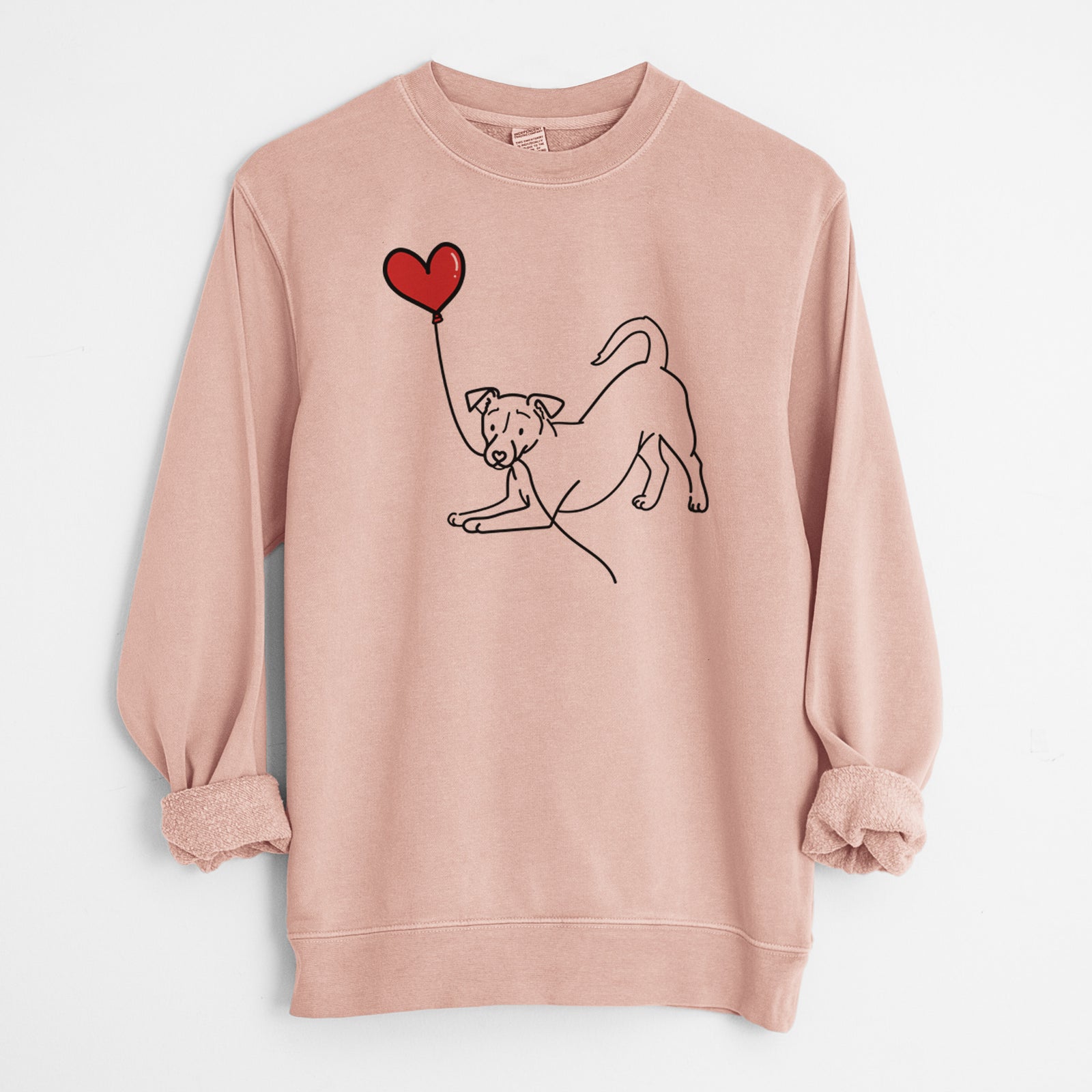 Minimalist line drawing of a Jack Russell Terrier Heart String holding a heart balloon on a Dusty Pink Unisex pigment dyed crew sweatshirt