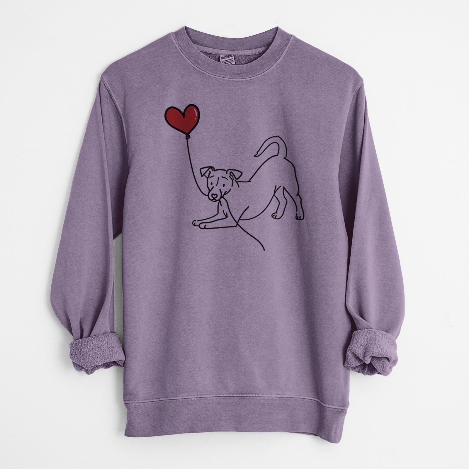 Minimalist line drawing of a Jack Russell Terrier Heart String holding a heart balloon on a Plum Unisex pigment dyed crew sweatshirt