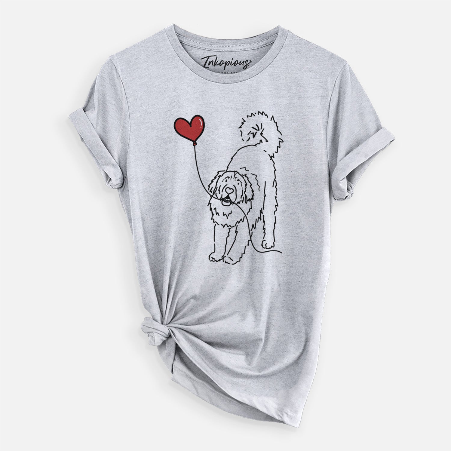 Minimalist line drawing of a Leonberger Heart String- Unisex Crewneck holding a heart balloon on a Grey Unisex crewneck, worn by a woman
