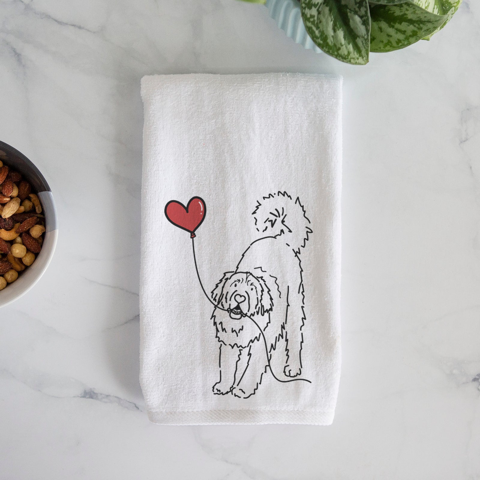 Minimalist line drawing of a Leonberger Heart String holding a heart balloon on a hand towel