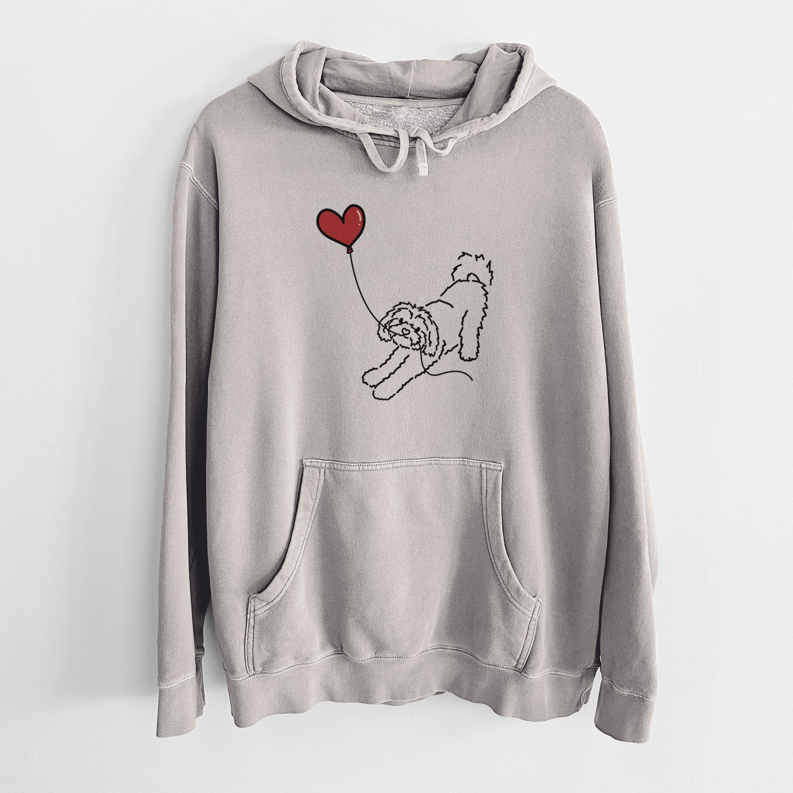 Minimalist line drawing of a Maltipoo Heart String holding a heart balloon on a Cement Unisex pigment dyed hoodie