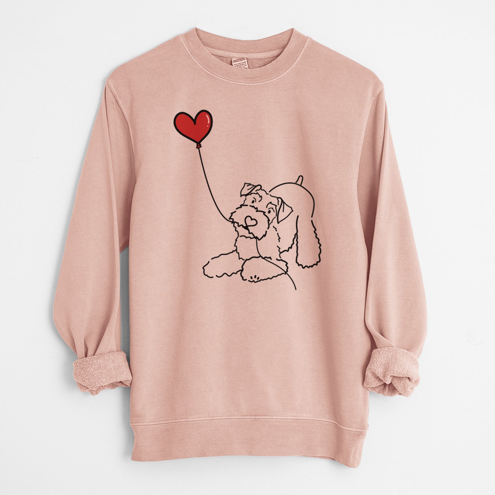 Minimalist line drawing of a Mini Schnauzer Heart String holding a heart balloon on a Dusty Pink Unisex pigment dyed crew sweatshirt