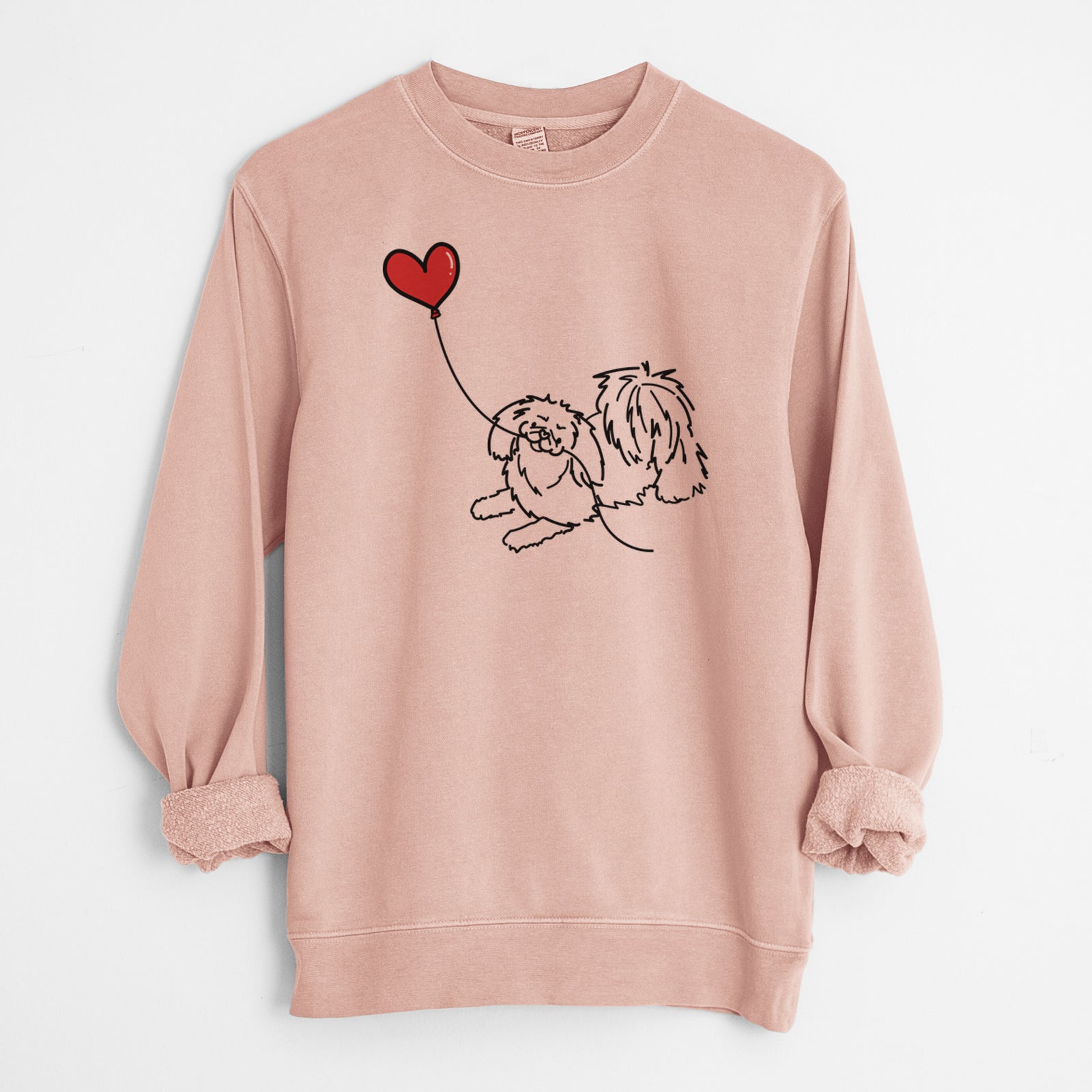 Minimalist line drawing of a Pekingese Heart String holding a heart balloon on a Dusty Pink Unisex pigment dyed crew sweatshirt