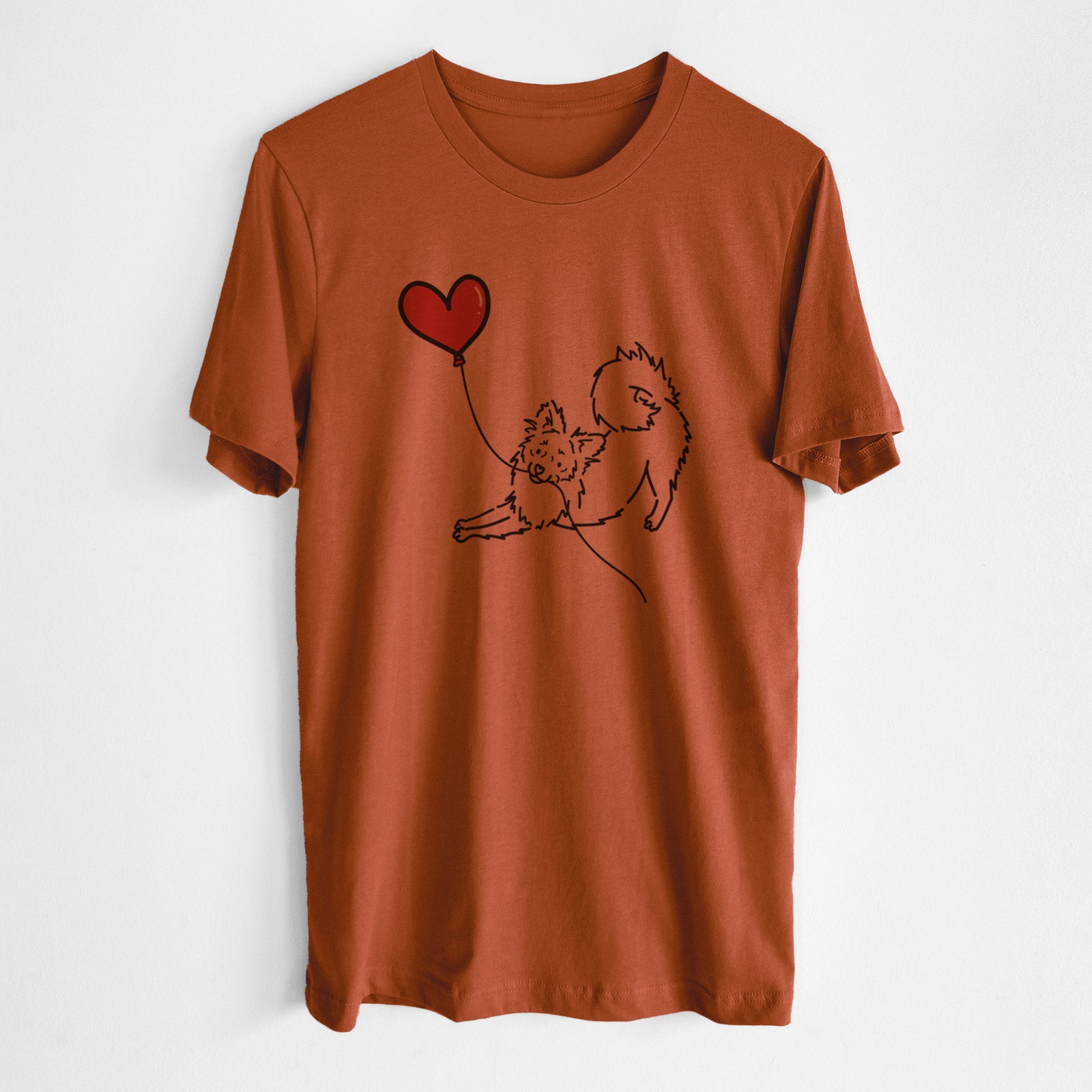 Minimalist line drawing of a Pomchi Heart String- Unisex Crewneck holding a heart balloon on an Autumn Unisex crewneck, worn by a man