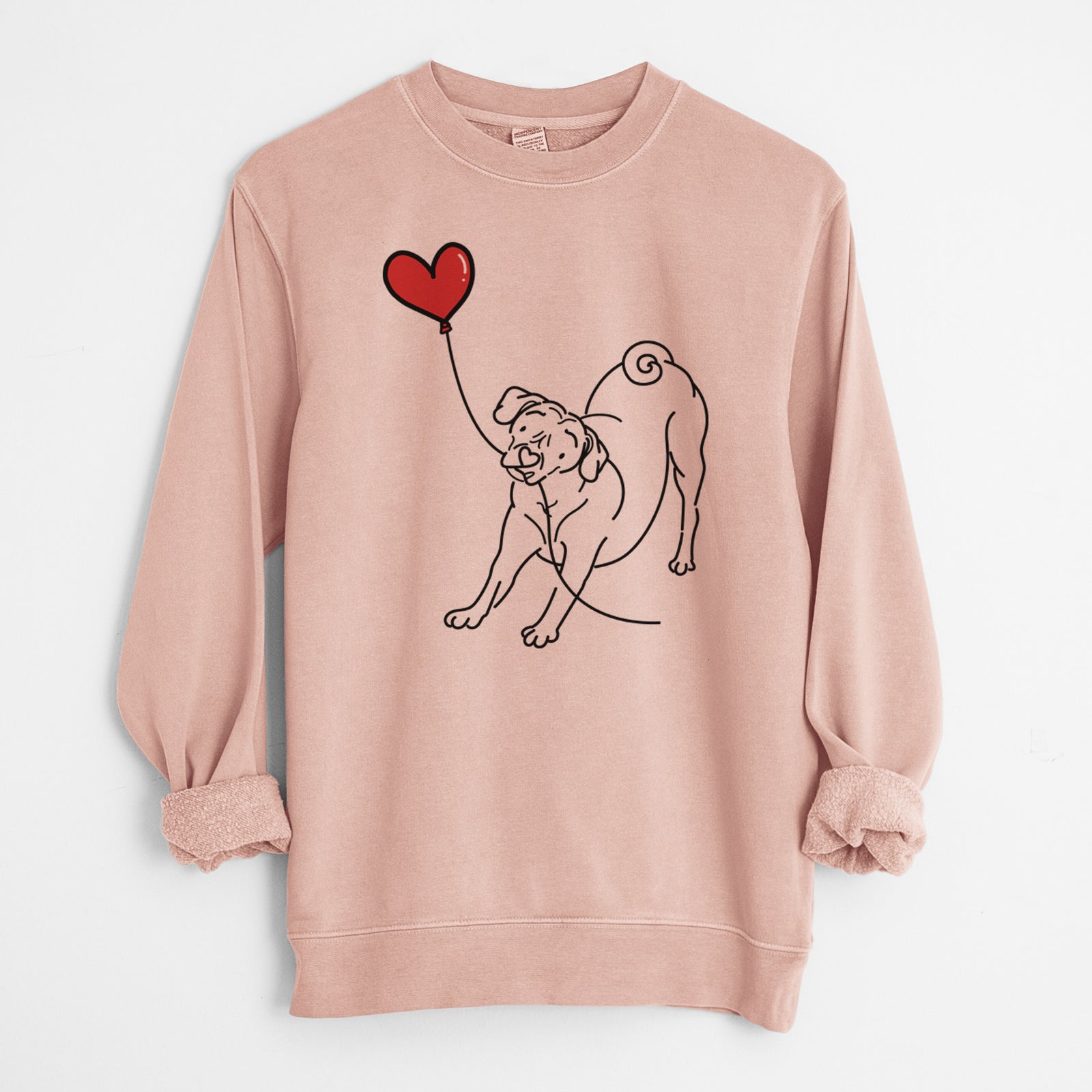 Minimalist line drawing of a Puggle Heart String holding a heart balloon on a Dusty Pink Unisex pigment dyed crew sweatshirt