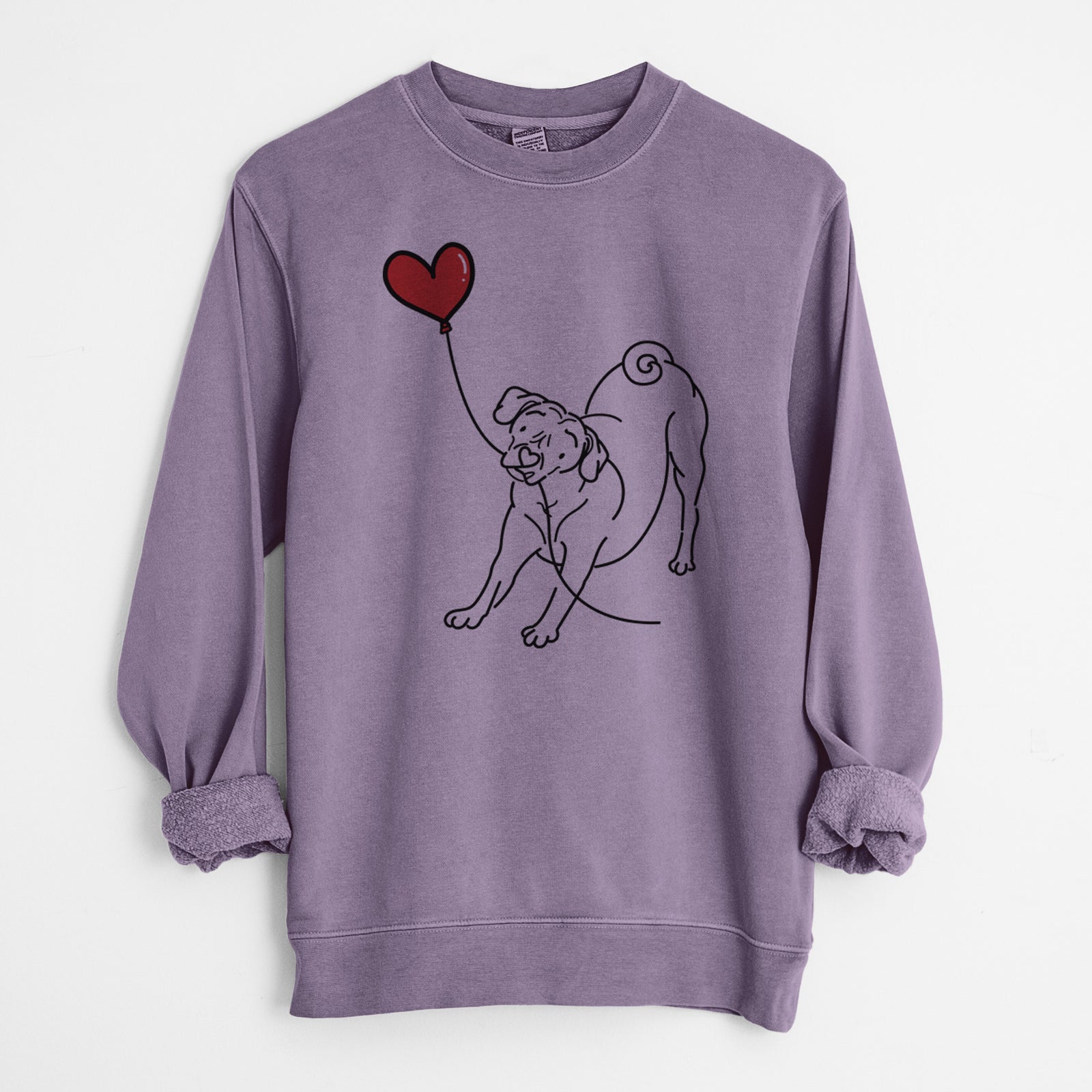 Minimalist line drawing of a Puggle Heart String holding a heart balloon on a Plum Unisex pigment dyed crew sweatshirt