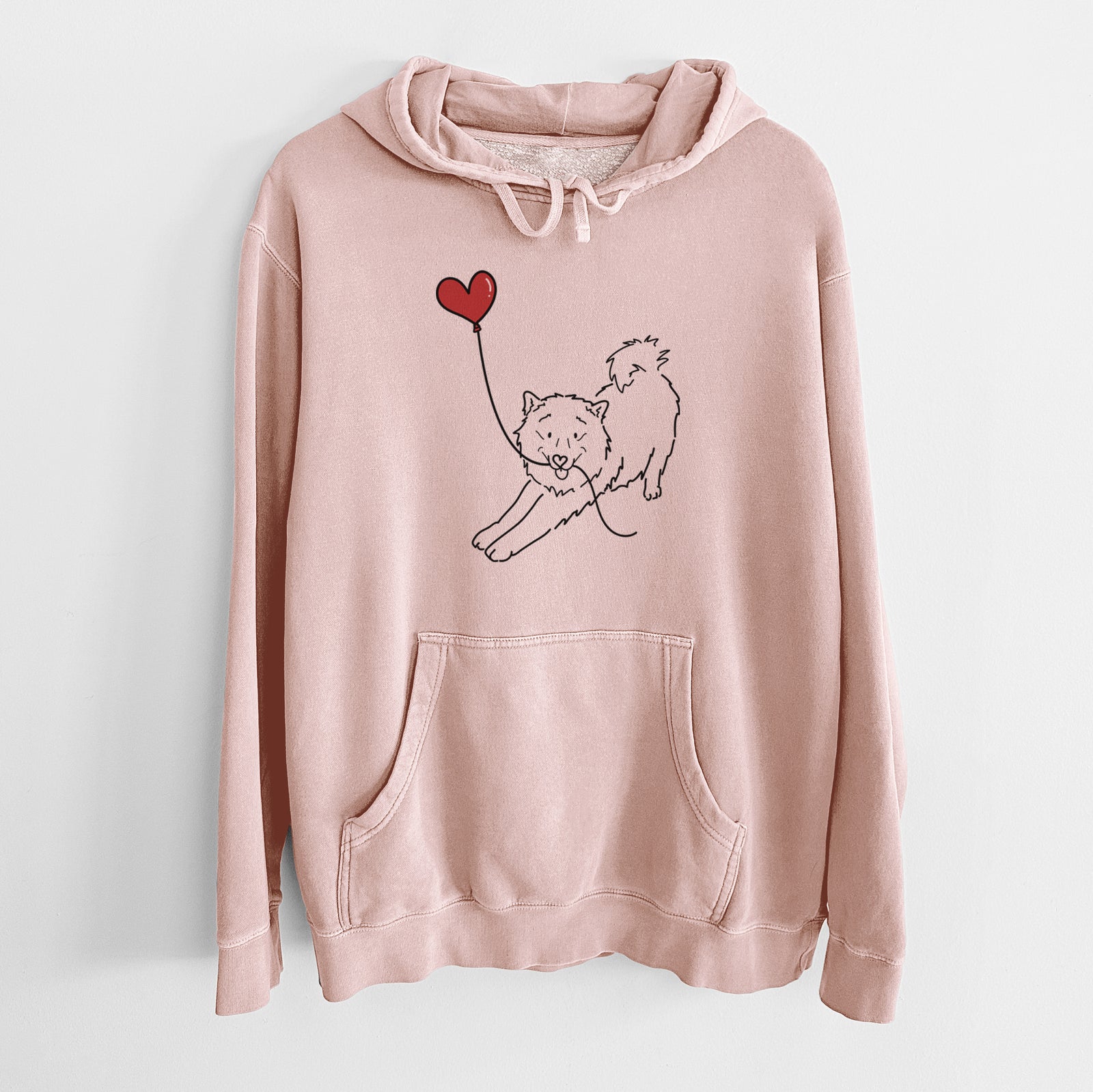 Minimalist line drawing of a Samoyed Heart String holding a heart balloon on a Dusty Pink Unisex pigment dyed hoodie