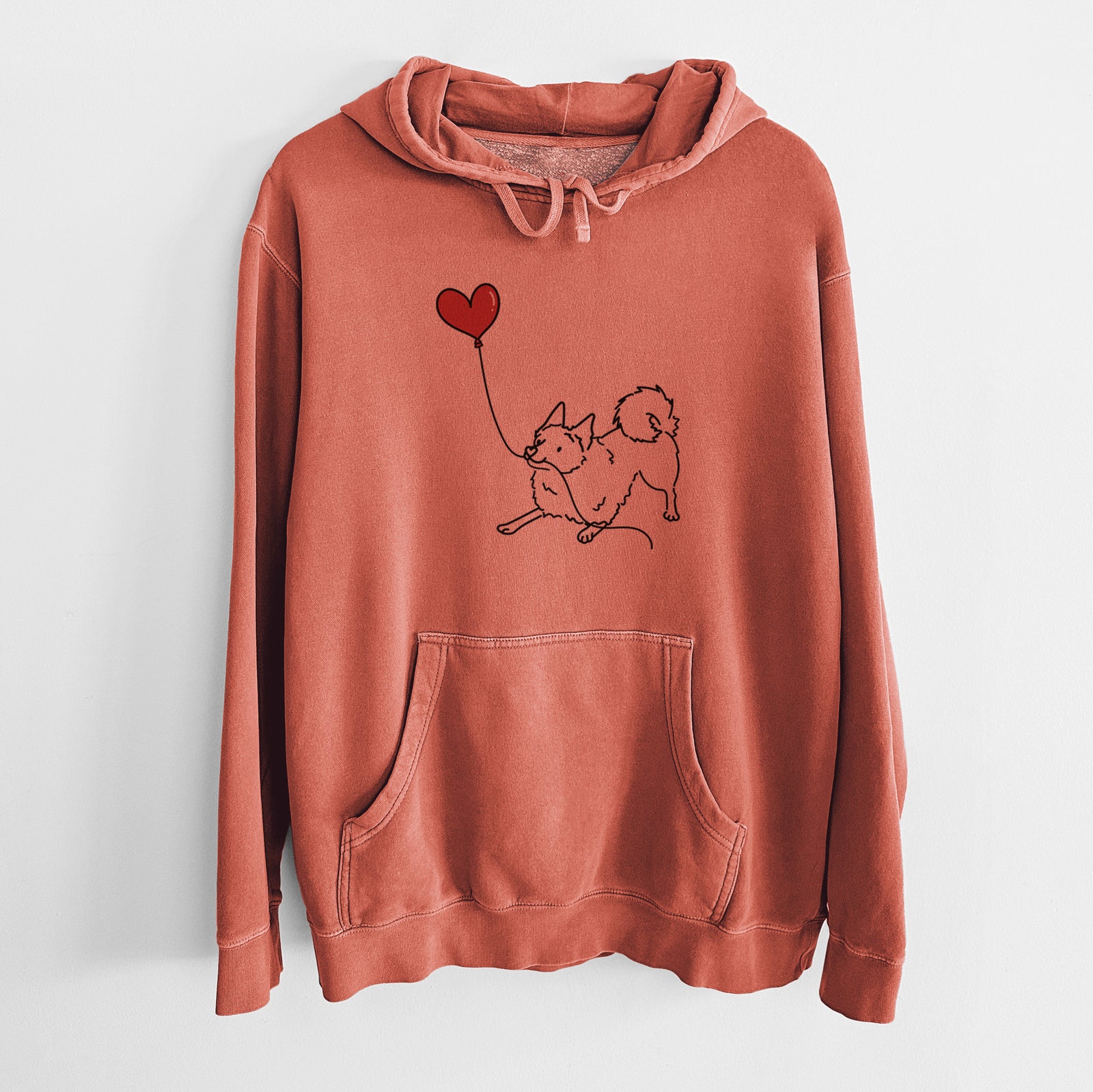 Minimalist line drawing of a Schipperke Heart String holding a heart balloon on an Amber Unisex pigment dyed hoodie