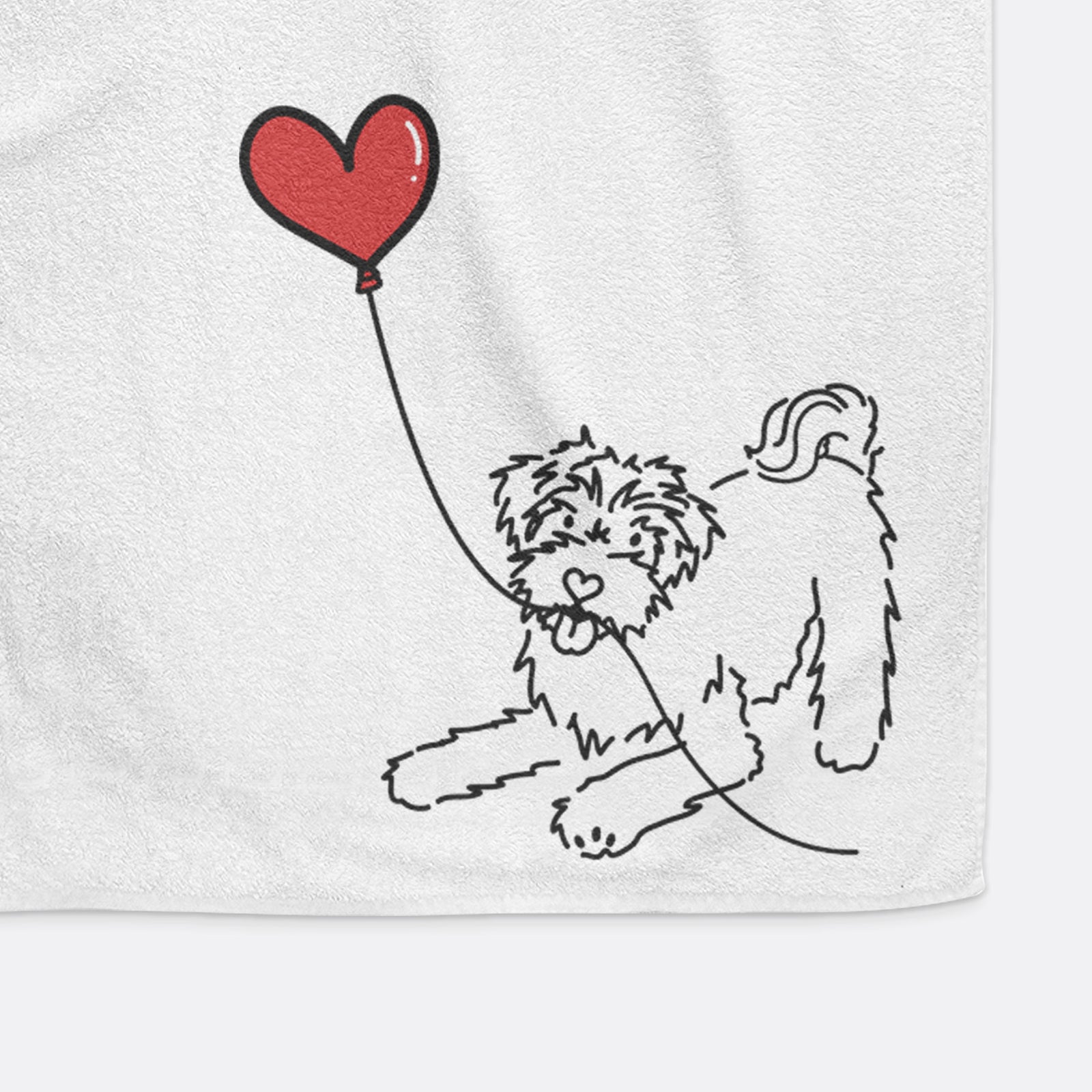 Minimalist line drawing of a Schnoodle Heart String holding a heart balloon on a hand towel