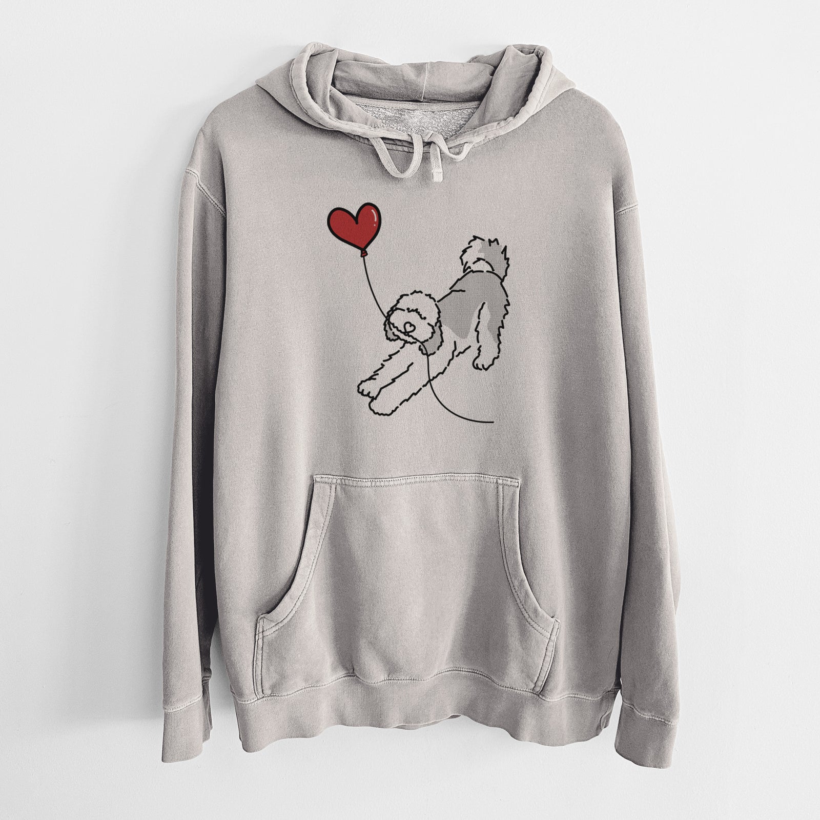 Minimalist line drawing of a Sheepadoodle Heart String holding a heart balloon on a Cement Unisex pigment dyed hoodie