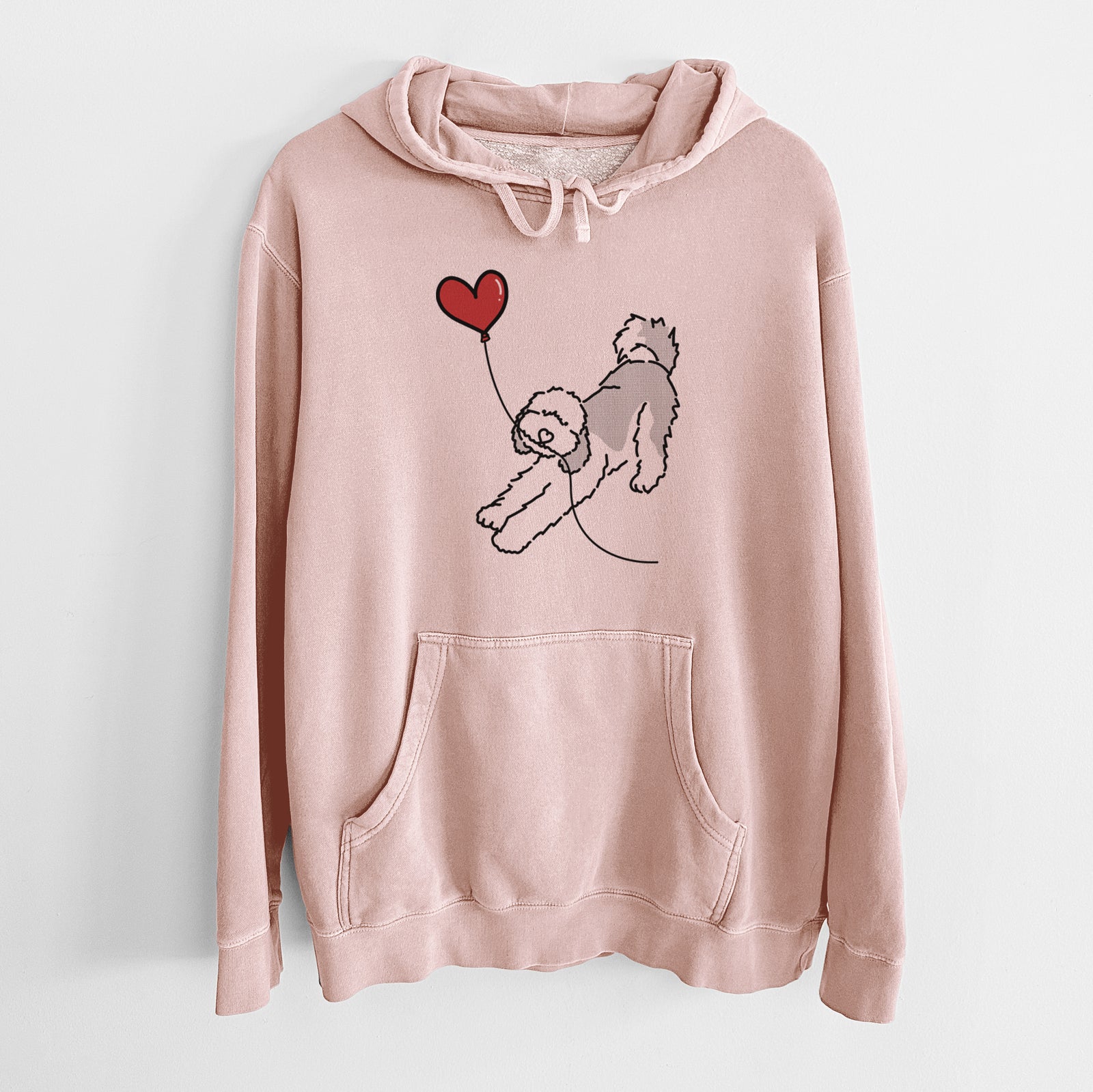 Minimalist line drawing of a Sheepadoodle Heart String holding a heart balloon on a Dusty Pink Unisex pigment dyed hoodie