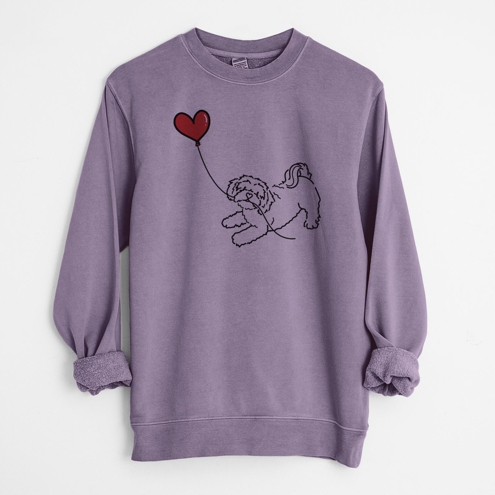 Minimalist line drawing of a Shihpoo Heart String holding a heart balloon on a Plum Unisex pigment dyed crew sweatshirt