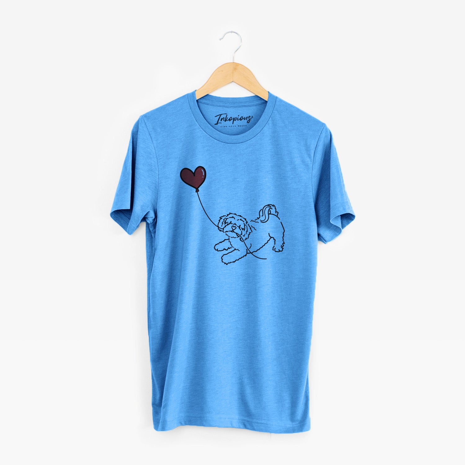 Minimalist line drawing of a Shihpoo Heart String holding a heart balloon on a Blue Unisex crewneck