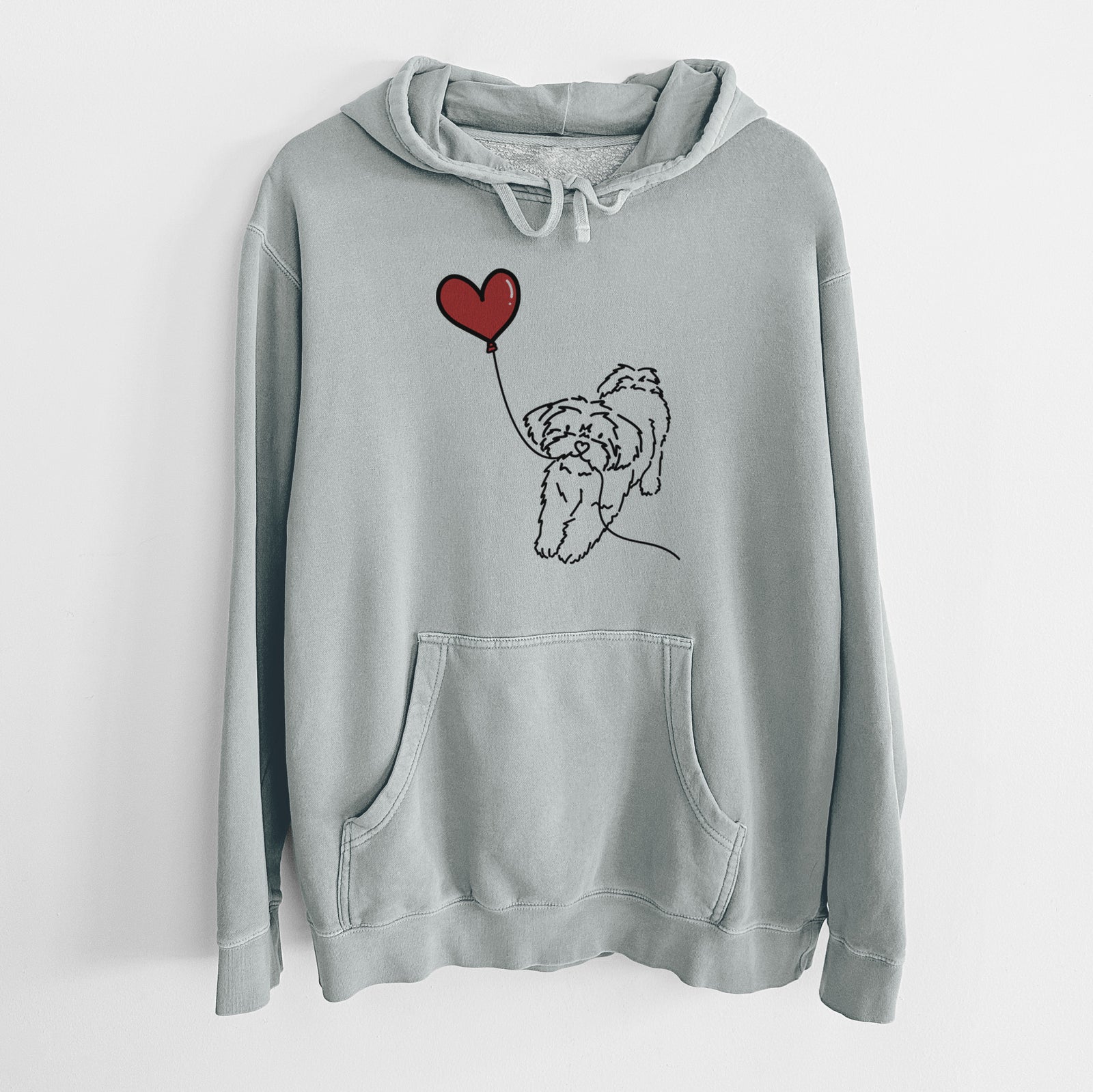 Minimalist line drawing of a Shorkie Heart String holding a heart balloon on a Sage Unisex pigment dyed hoodie