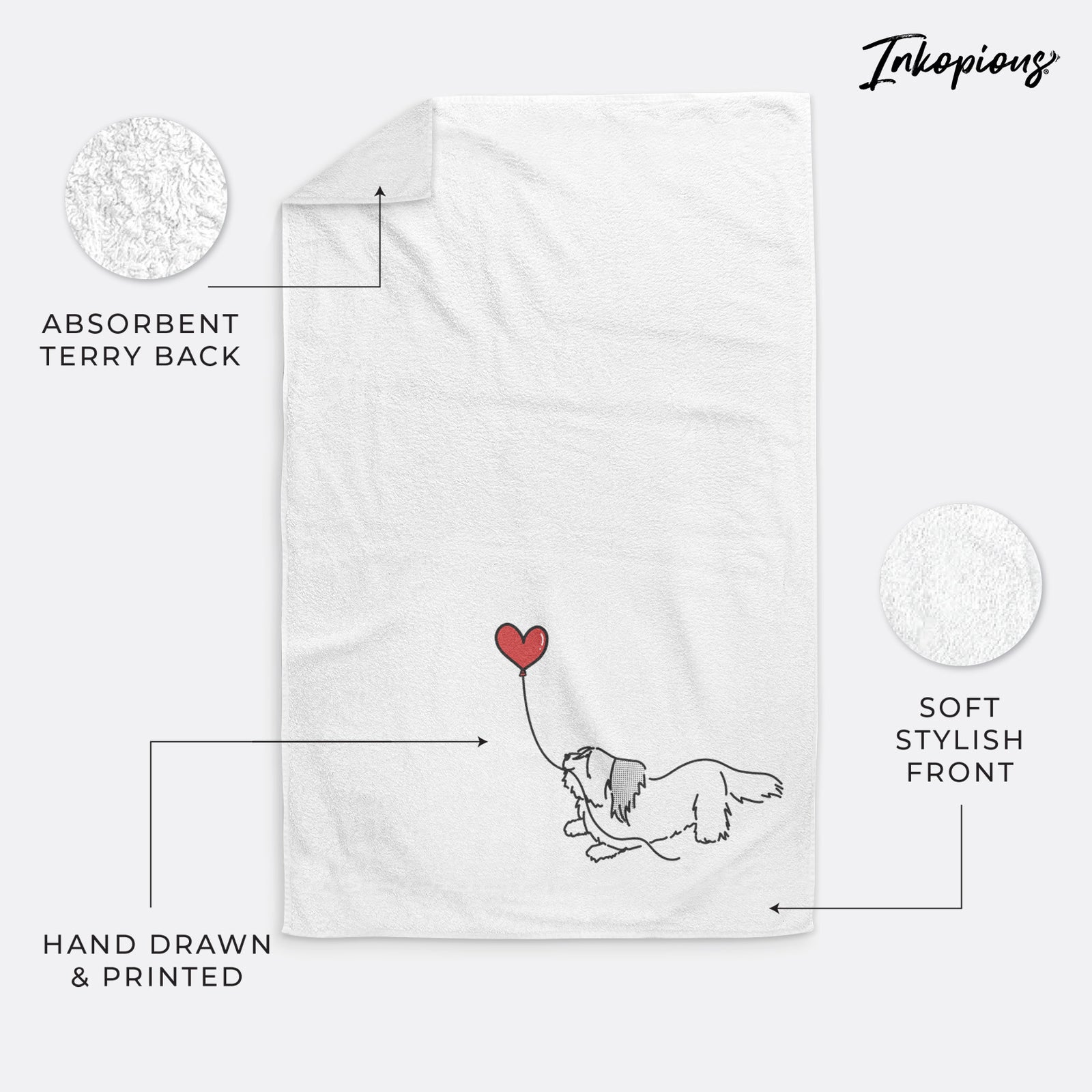 Minimalist line drawing of a Skye Terrier Heart String holding a heart balloon on a decorative hand towel