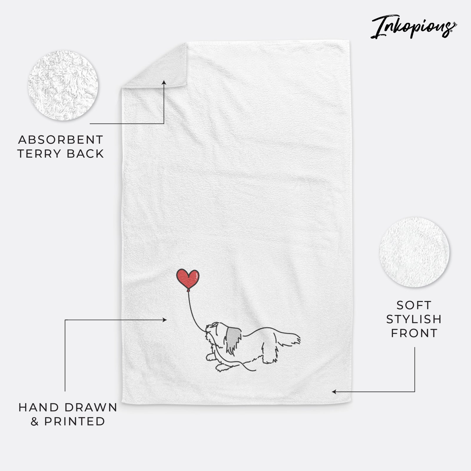 Minimalist line drawing of a Skye Terrier Heart String holding a heart balloon on a decorative hand towel