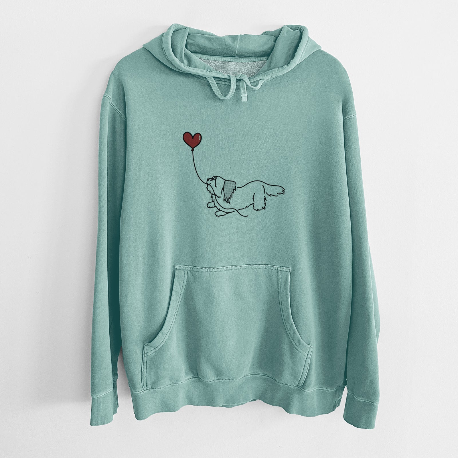 Minimalist line drawing of a Skye Terrier Heart String holding a heart balloon on a Mint Unisex pigment dyed hoodie