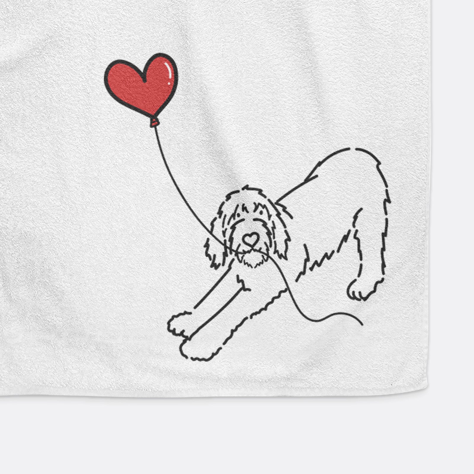 Minimalist line drawing of a Spinone Italiano Heart String holding a heart balloon on a decorative hand towel