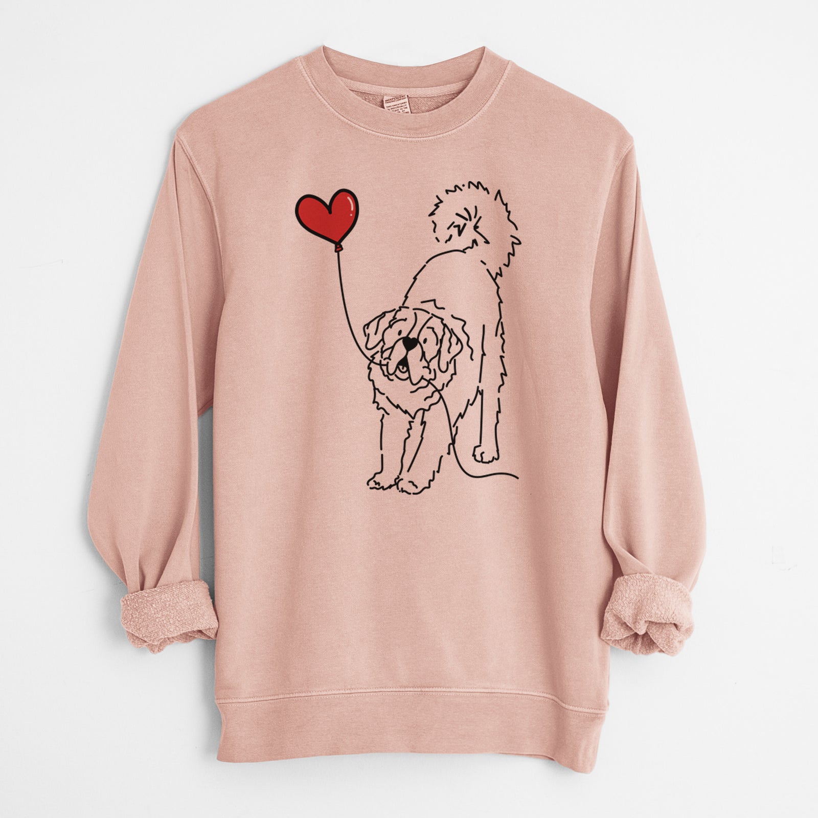 Minimalist line drawing of a Saint Bernard Heart String holding a heart balloon on a Dusty Pink Unisex pigment dyed crew sweatshirt
