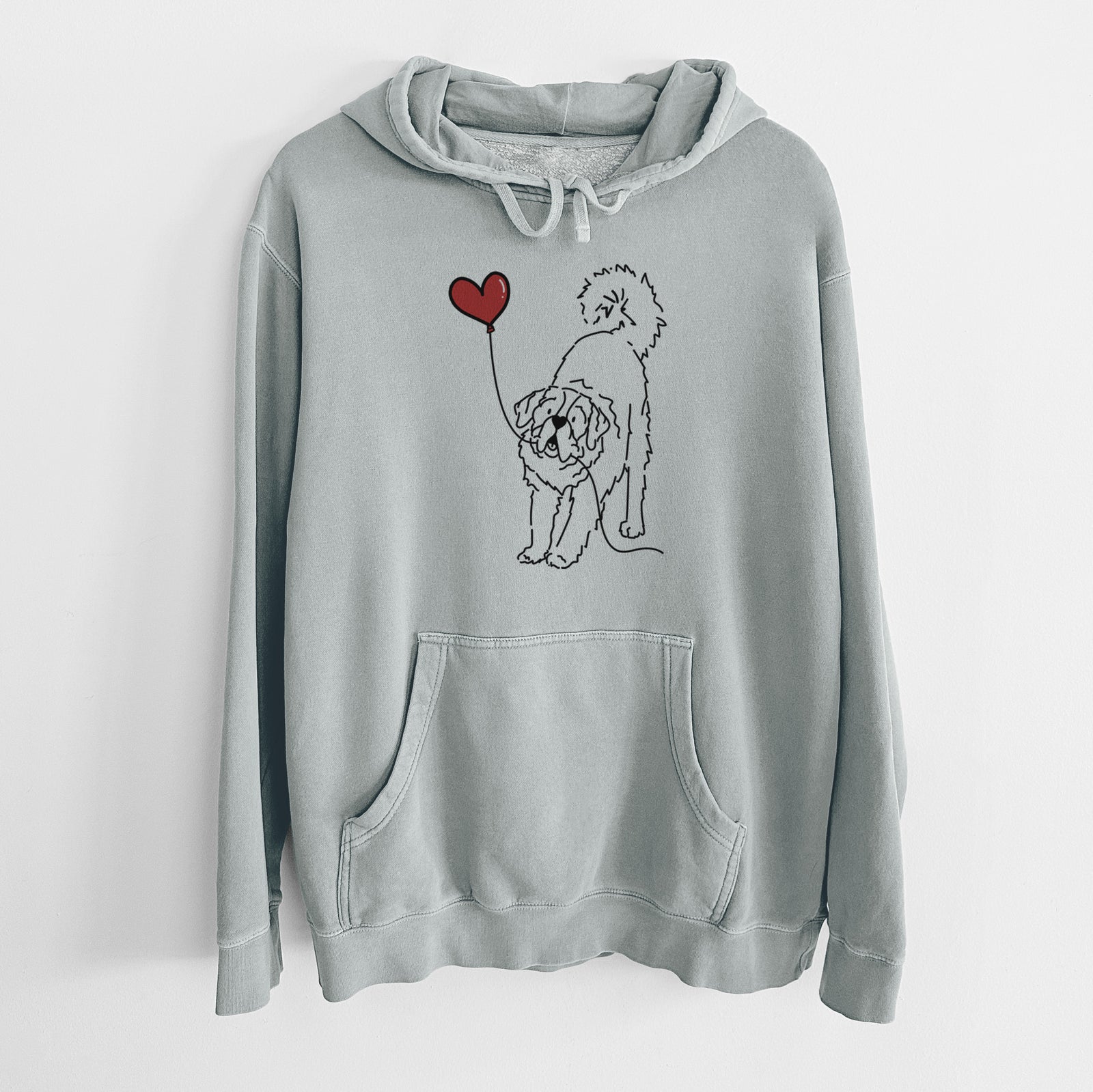 Minimalist line drawing of a Saint Bernard Heart String holding a heart balloon on a Sage Unisex pigment dyed hoodie