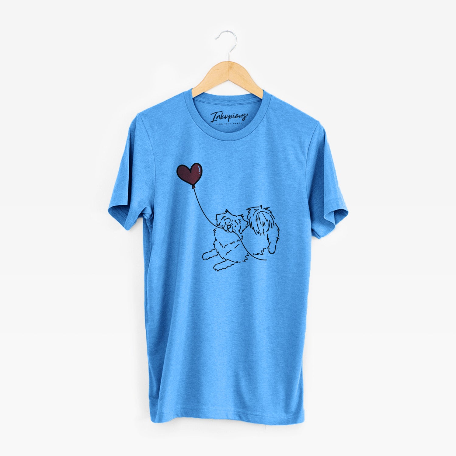 Minimalist line drawing of a Tibetan Spaniel Heart String holding a heart balloon on a Blue Unisex crewneck