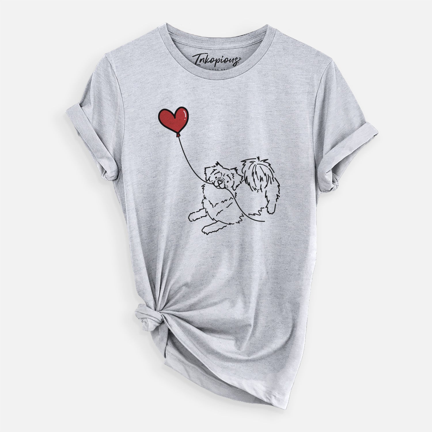Minimalist line drawing of a Tibetan Spaniel Heart String holding a heart balloon on a Grey Unisex crewneck