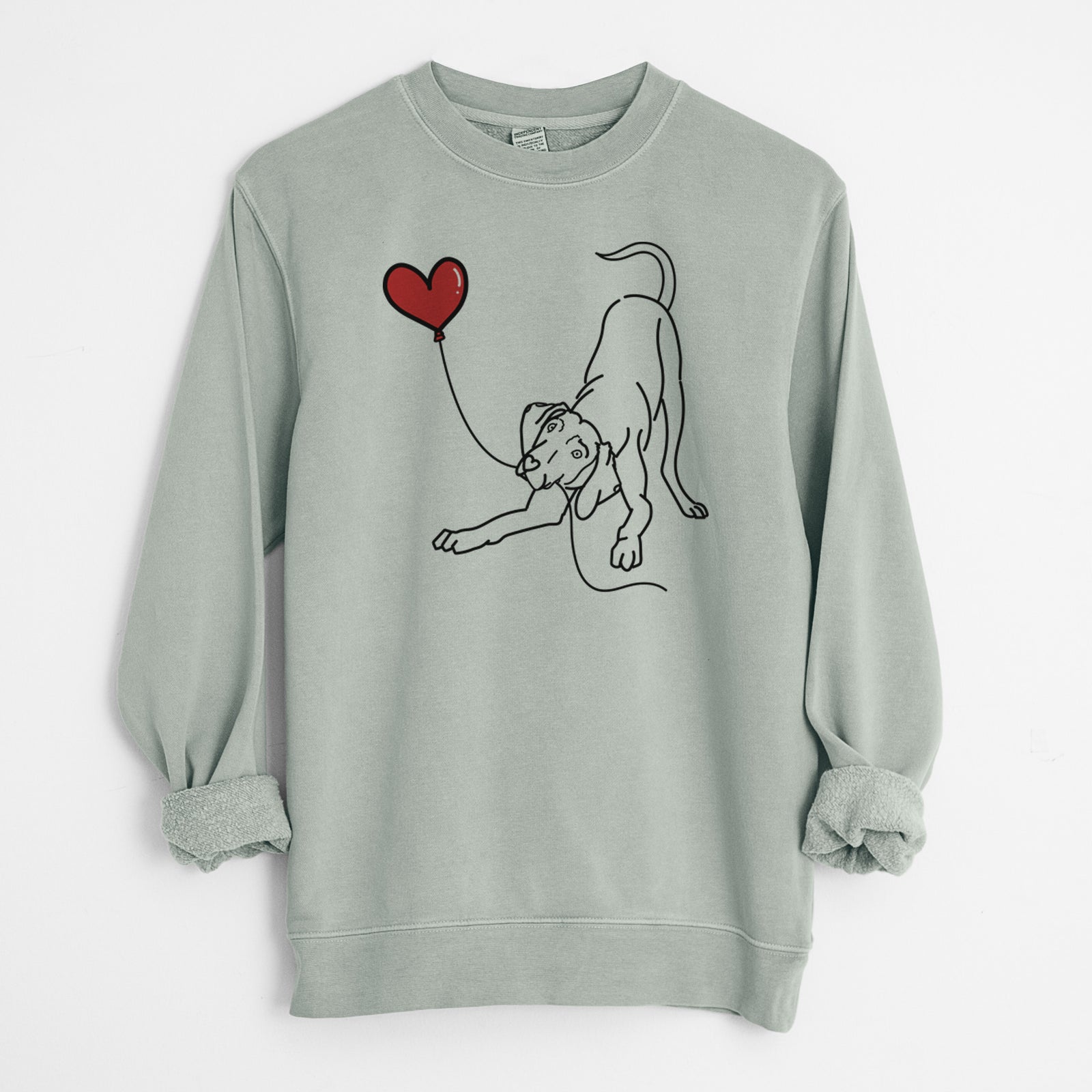 Minimalist line drawing of a Weimaraner Heart String holding a heart balloon on a Sage Unisex pigment dyed crew sweatshirt