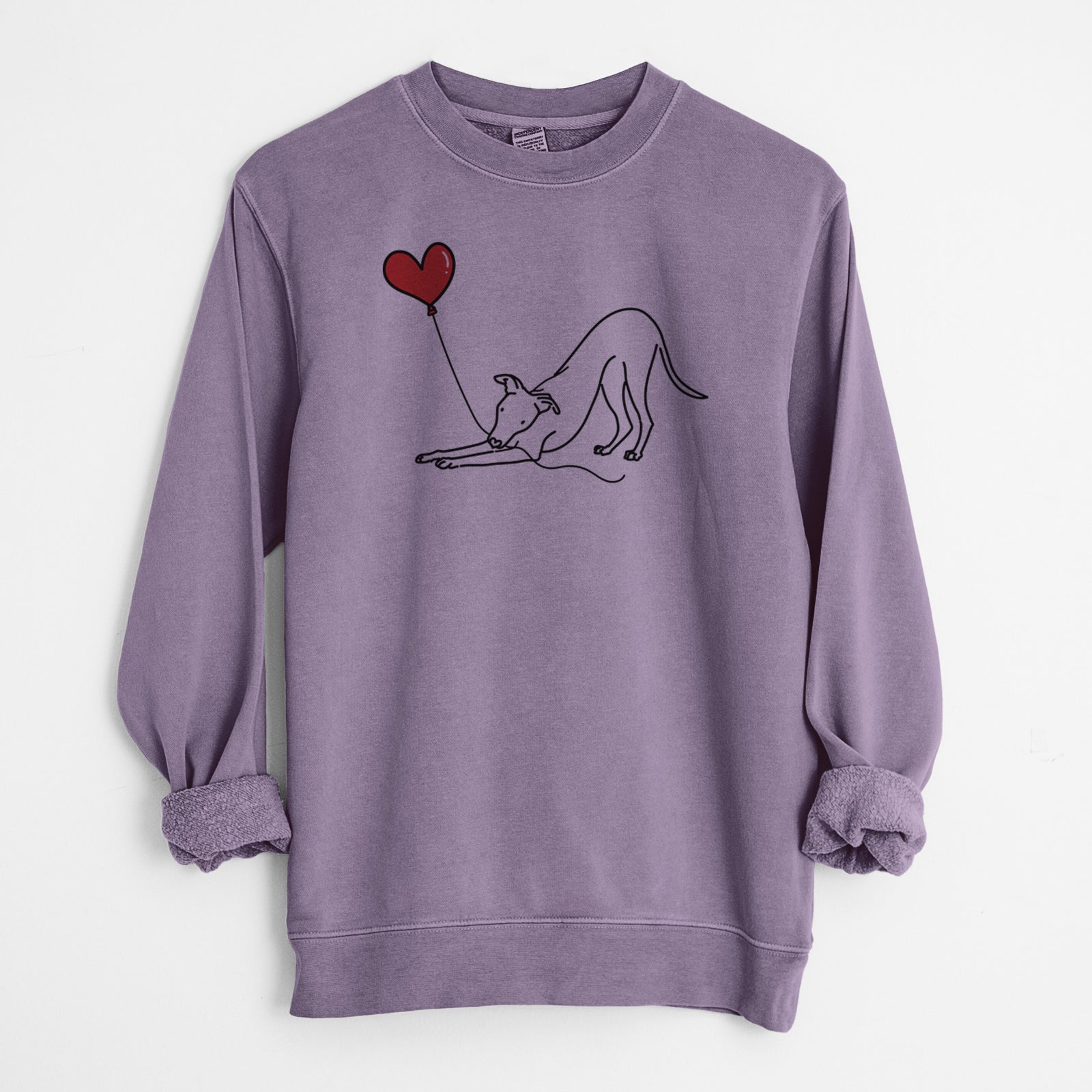 Minimalist line drawing of a Whippet Heart String holding a heart balloon on a Plum Unisex pigment dyed crew sweatshirt