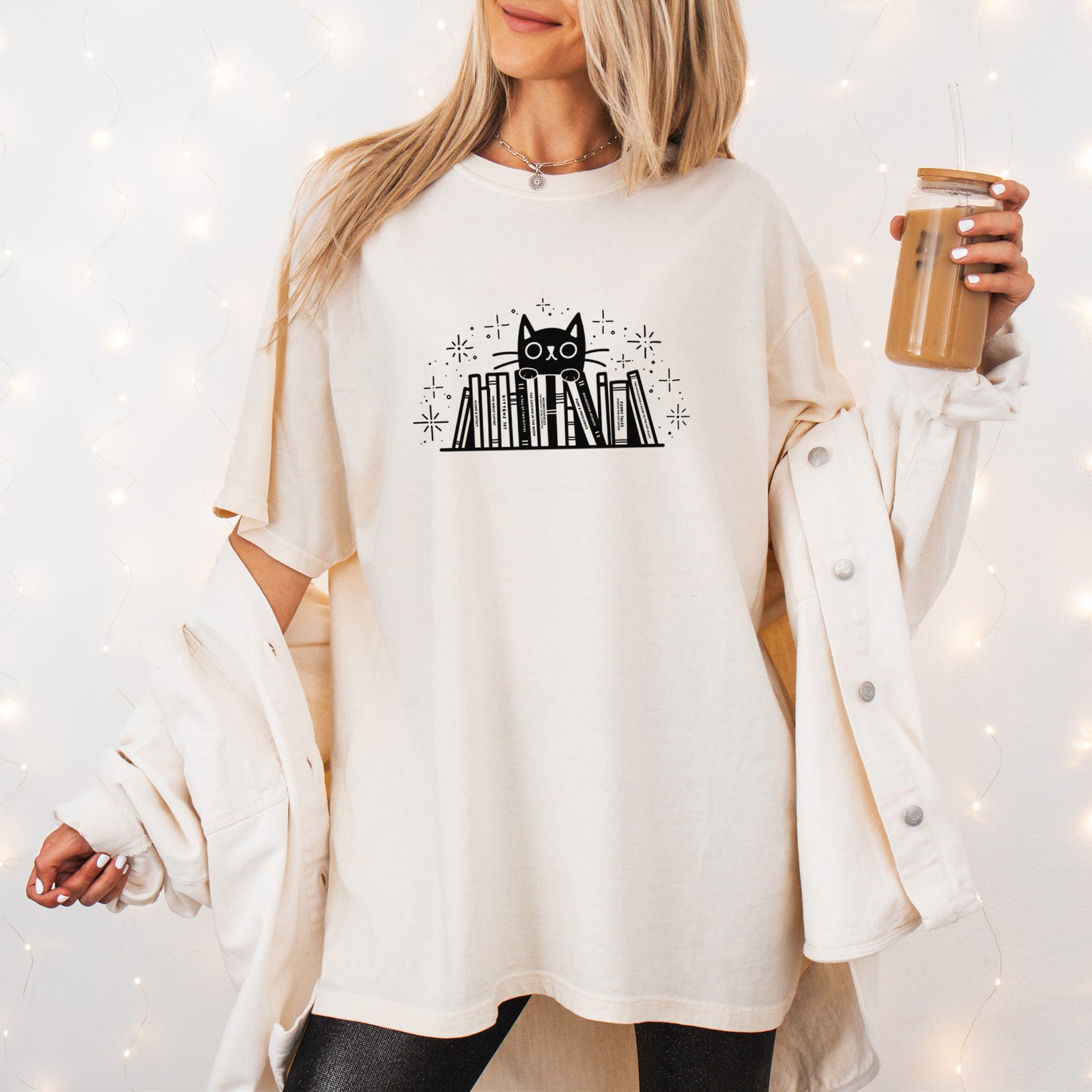 Kitty Library - Black Cat Behind Books - Unisex Comfort Colors Garment-Dyed Heavyweight T-shirt, worn by model