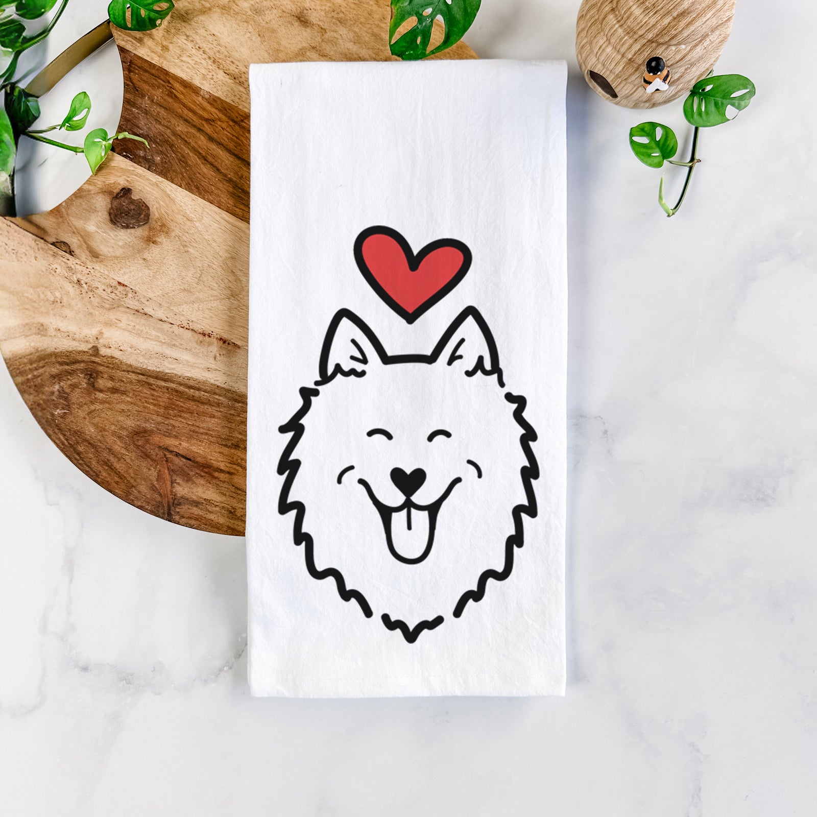 Minimalist line drawing of an American Eskimo with a red heart on a tea towel