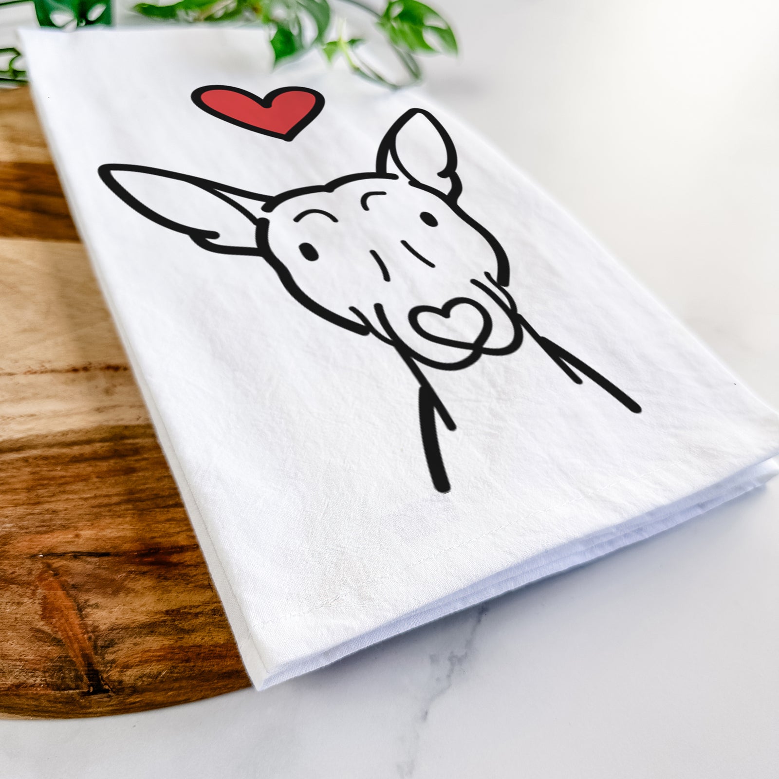 Minimalist line drawing of an American Hairless Terrier with a red heart on a tea towel
