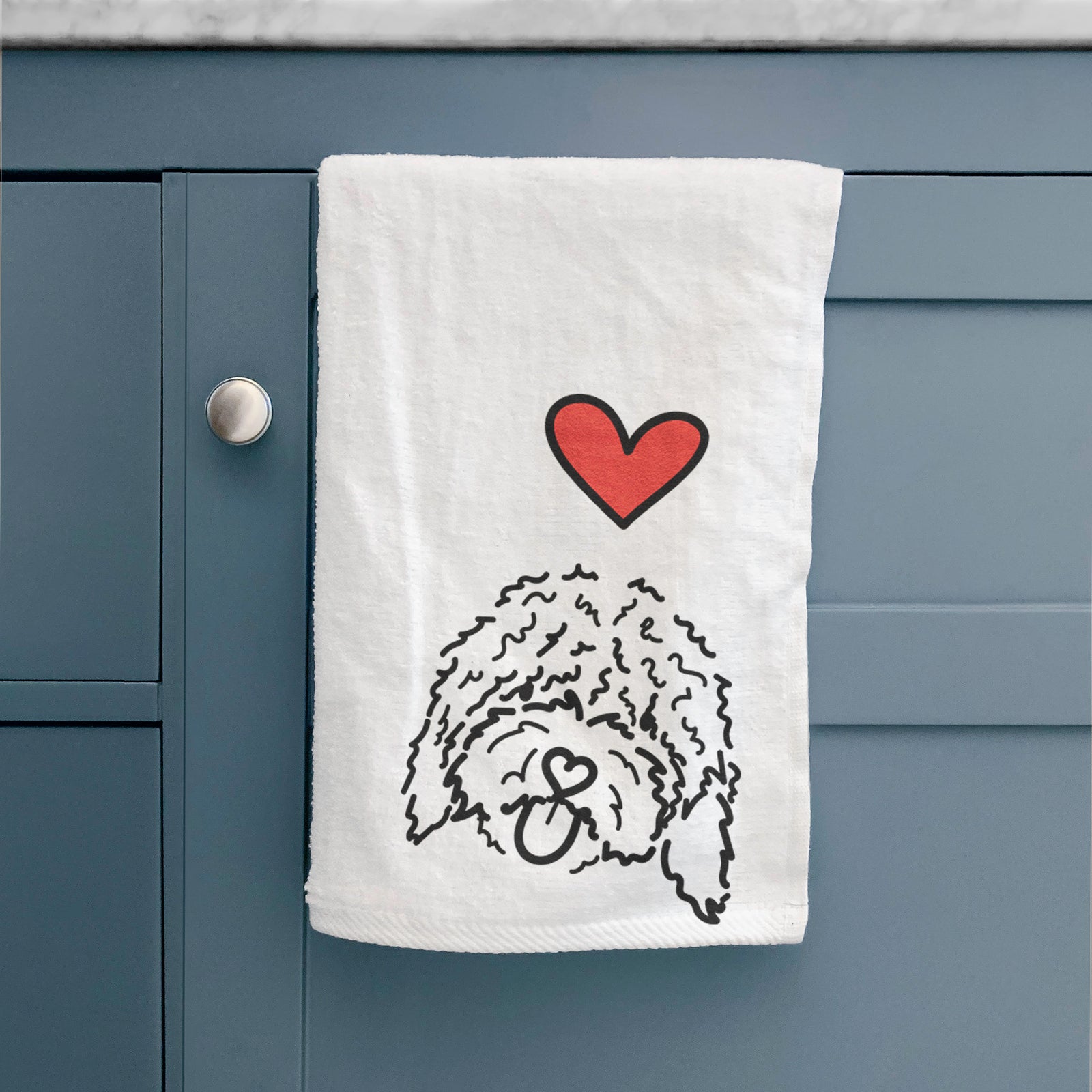 Minimalist line drawing of Antonio the Spanish Water Dog with a red heart on a decorative hand towel