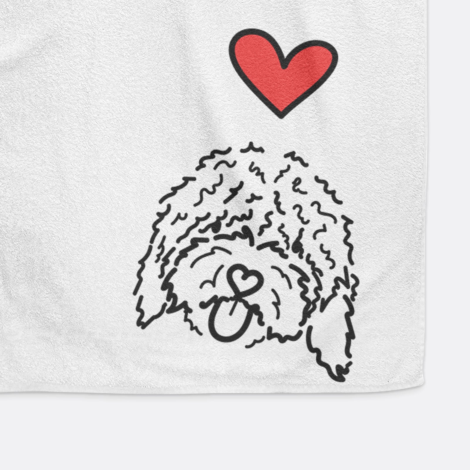 Minimalist line drawing of Antonio the Spanish Water Dog with a red heart on a decorative hand towel