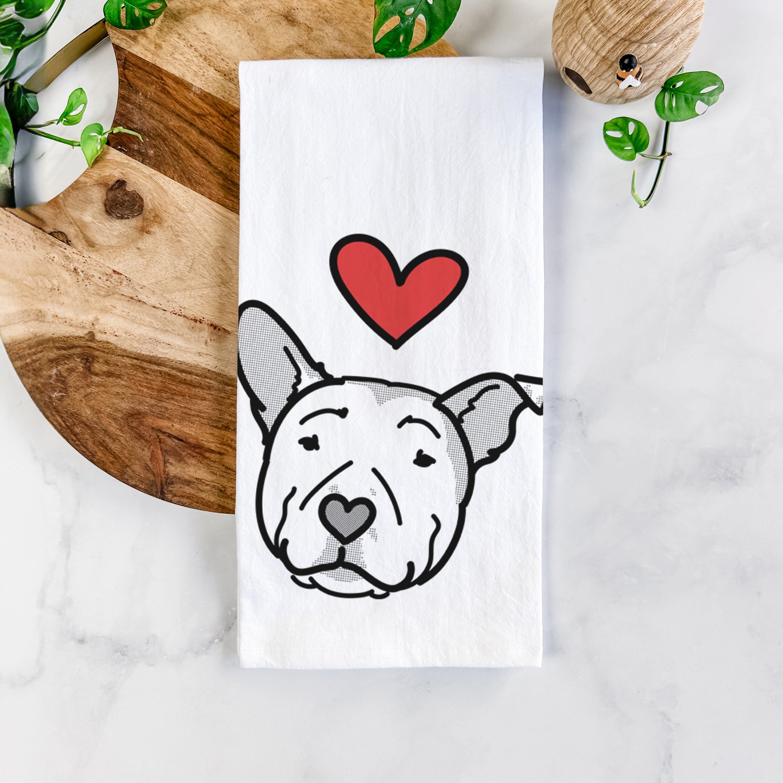 Minimalist line drawing of Archer the Pitbull with a red heart on a tea towel