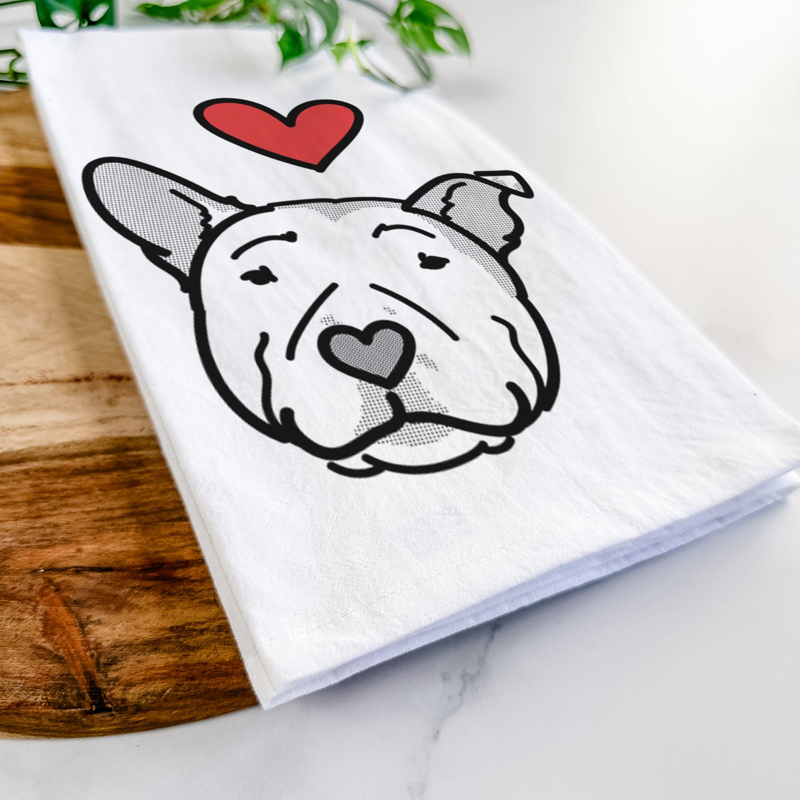 Minimalist line drawing of Archer the Pitbull with a red heart on a tea towel