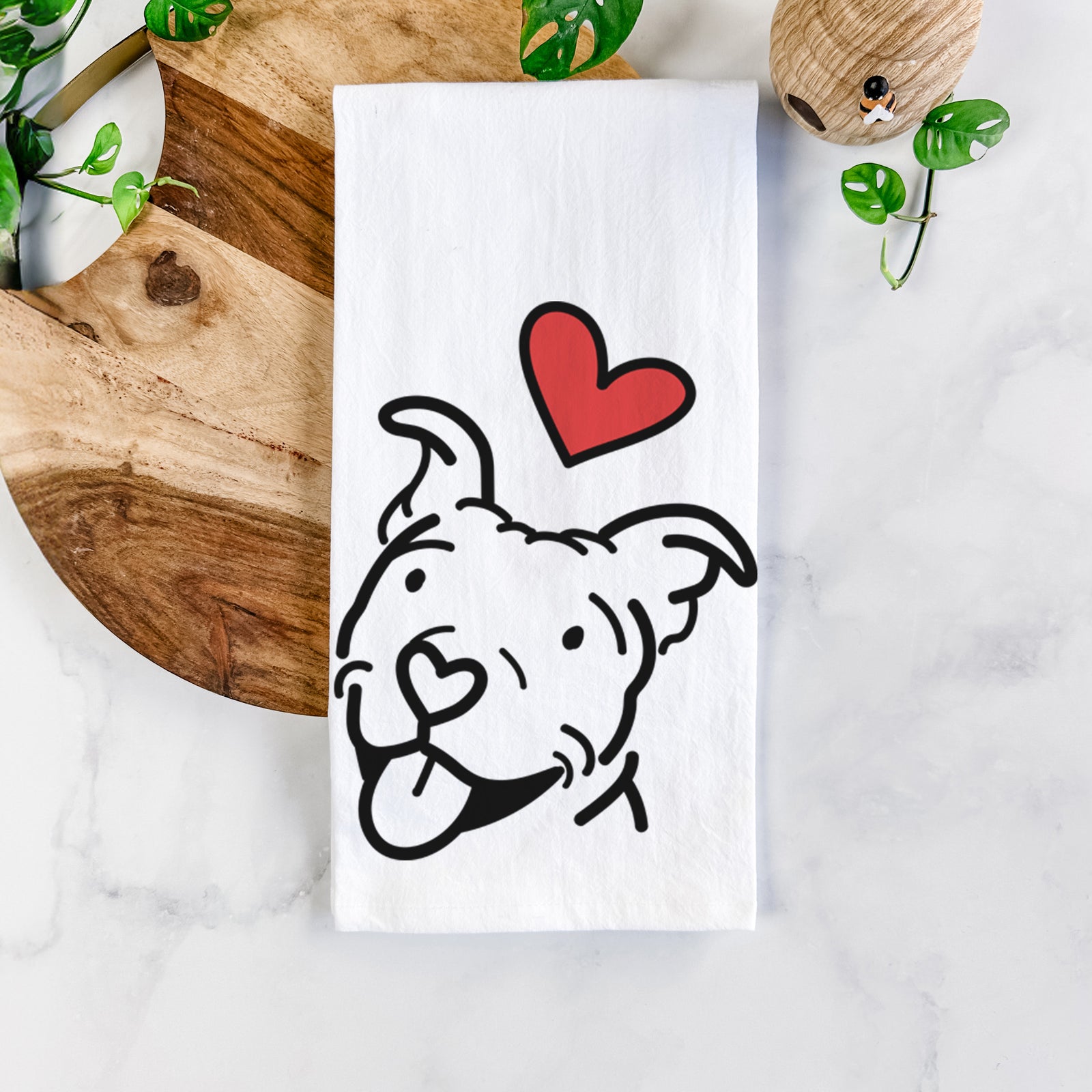 Minimalist line drawing of Arlo the Pitbull with a red heart on a tea towel