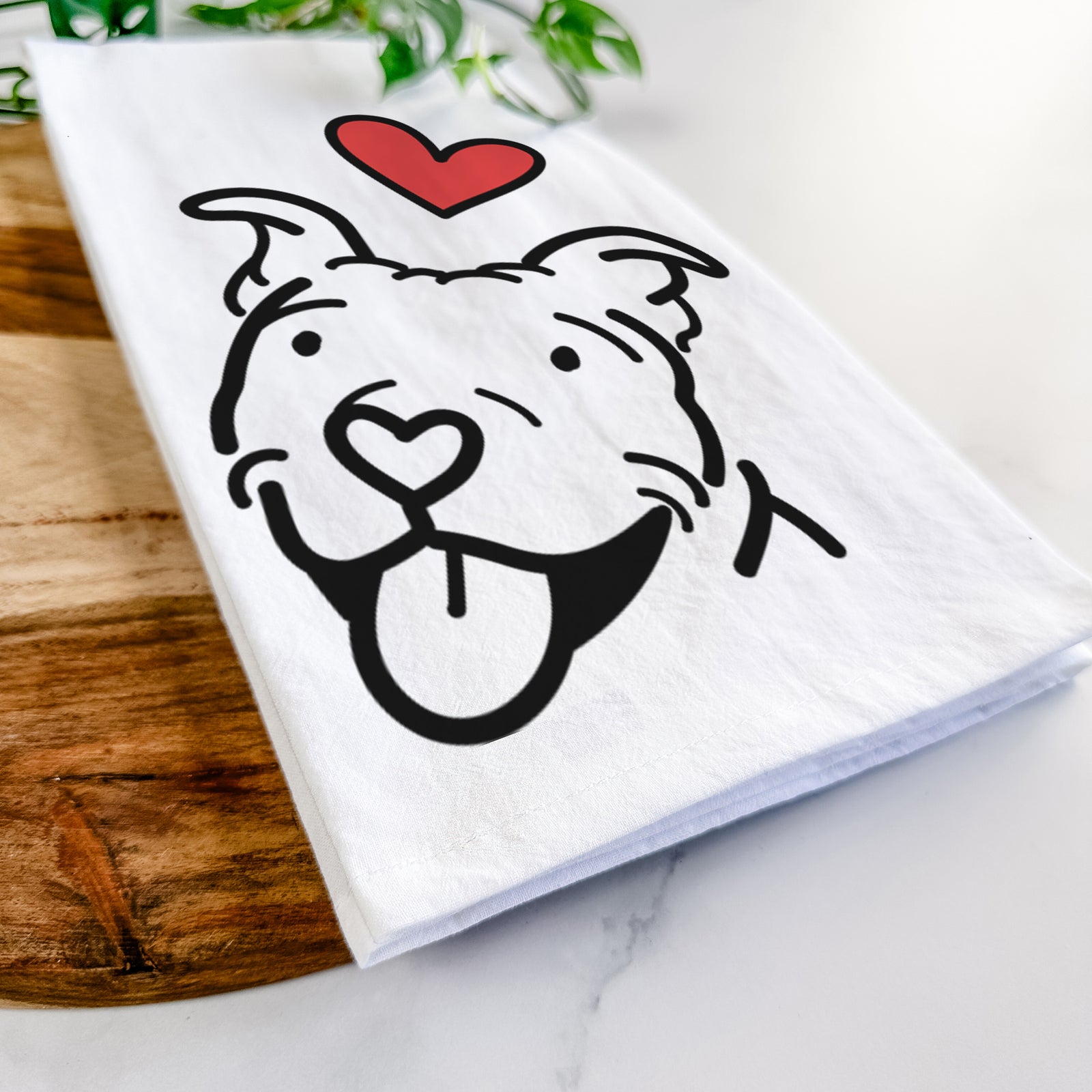 Minimalist line drawing of Arlo the Pitbull with a red heart on a tea towel