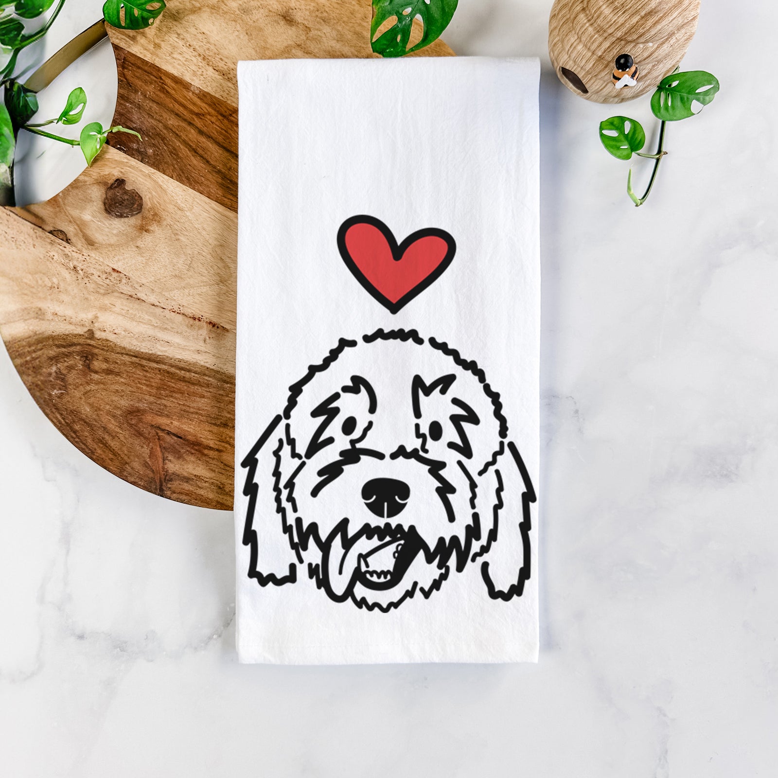 Minimalist line drawing of Barry the Goldendoodle with a red heart on a tea towel