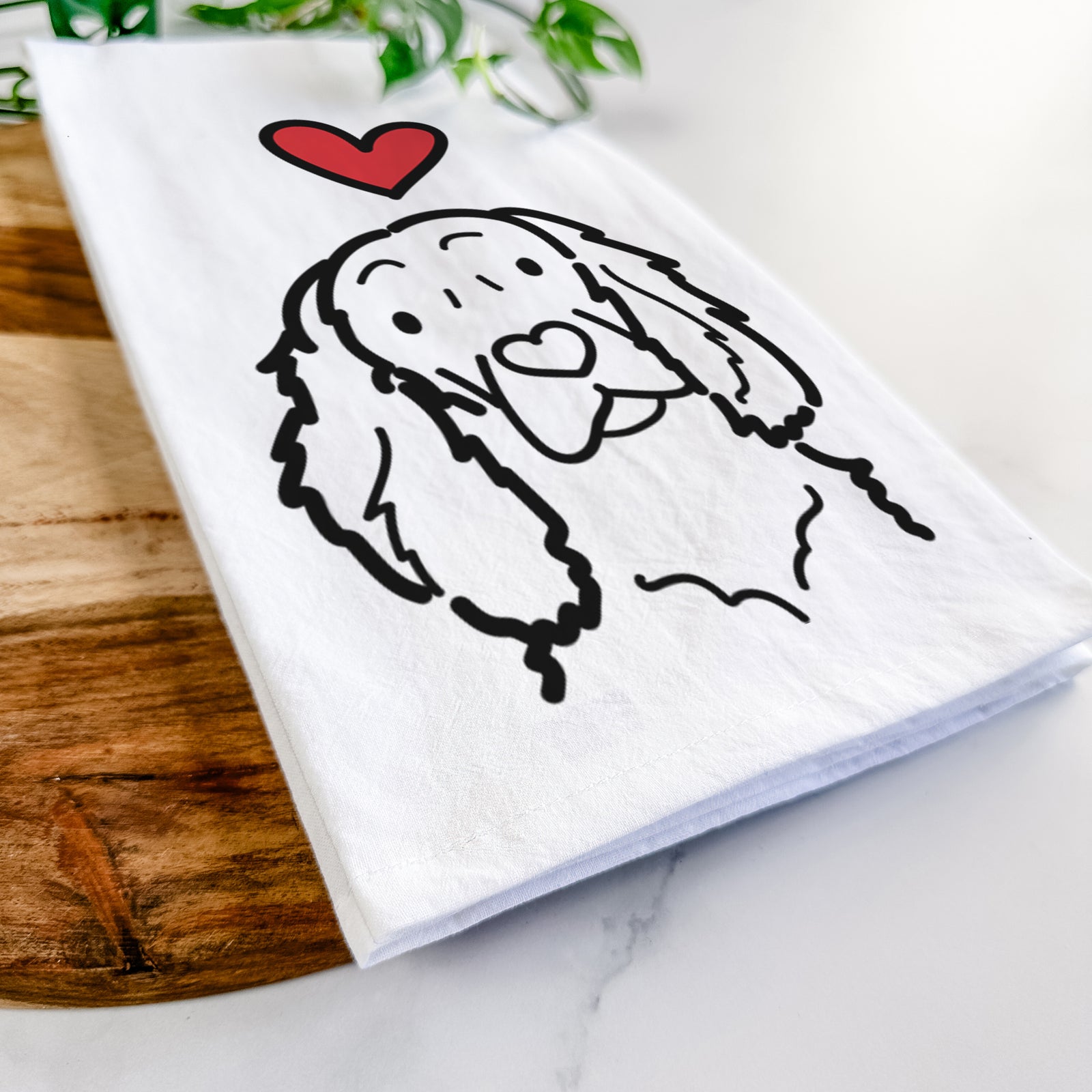 Minimalist line drawing of a Boykin Spaniel with a red heart on a tea towel