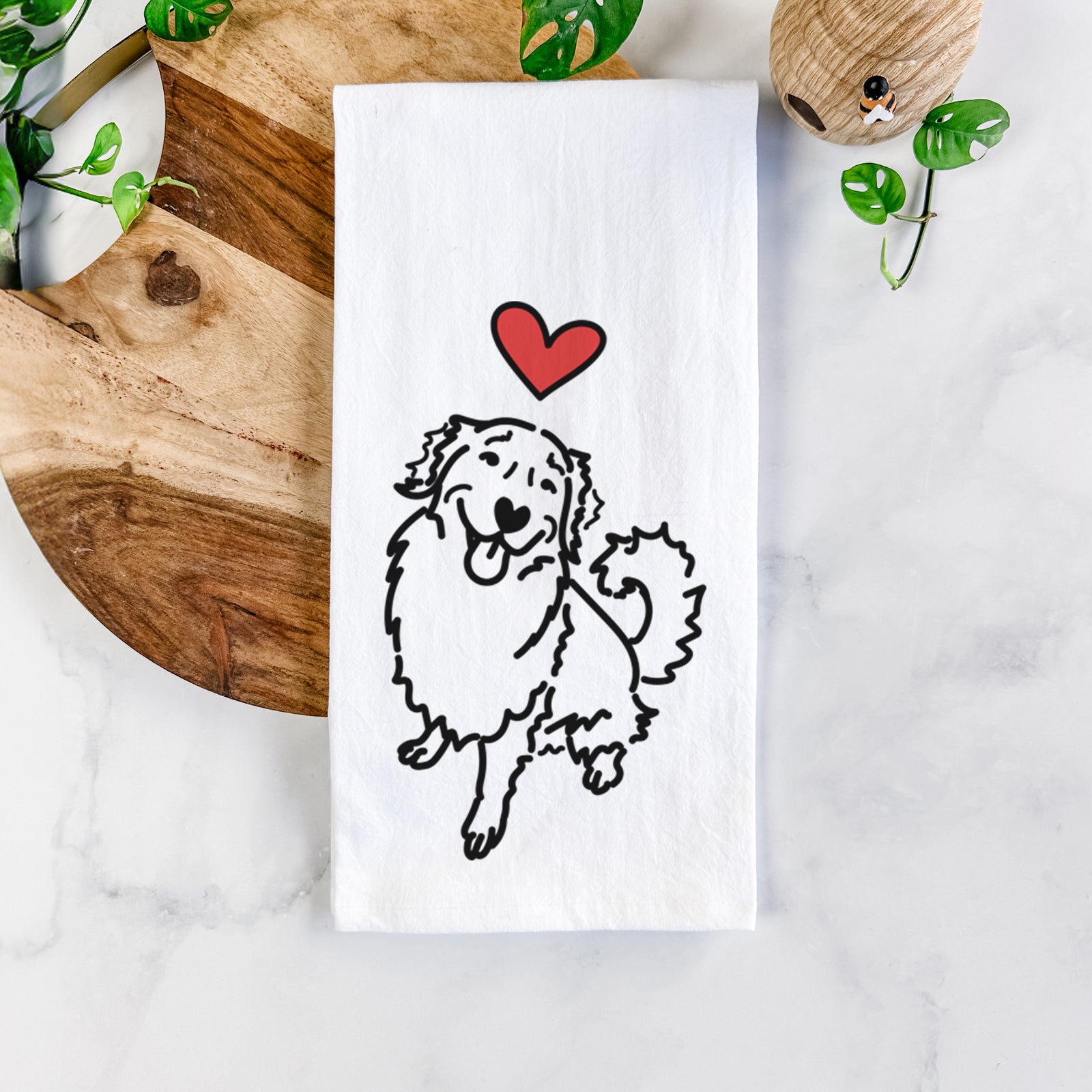 Minimalist line drawing of Brinkley the Golden Retriever with a red heart on a tea towel