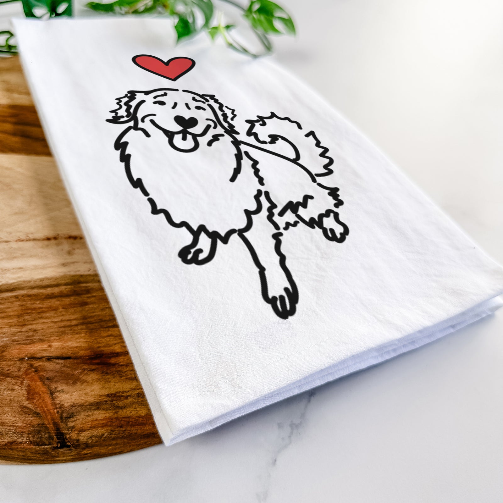 Minimalist line drawing of Brinkley the Golden Retriever with a red heart on a tea towel