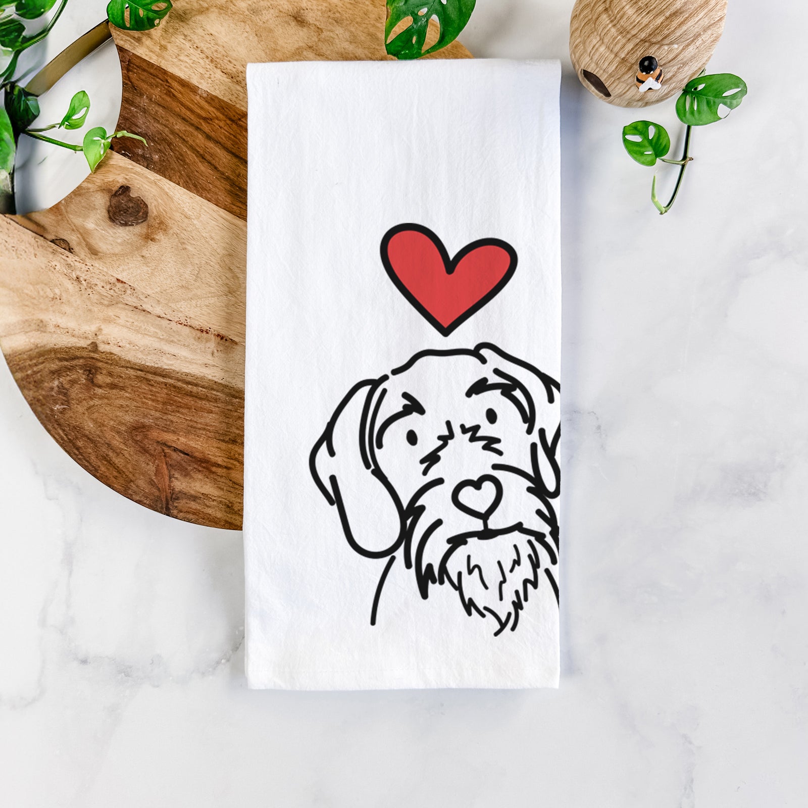 Minimalist line drawing of Buck the German Wirehaired Pointer with a red heart on a tea towel