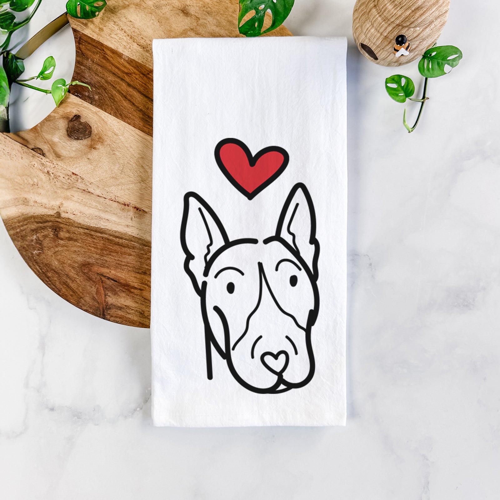 Minimalist line drawing of a Bull Terrier with a red heart on a tea towel