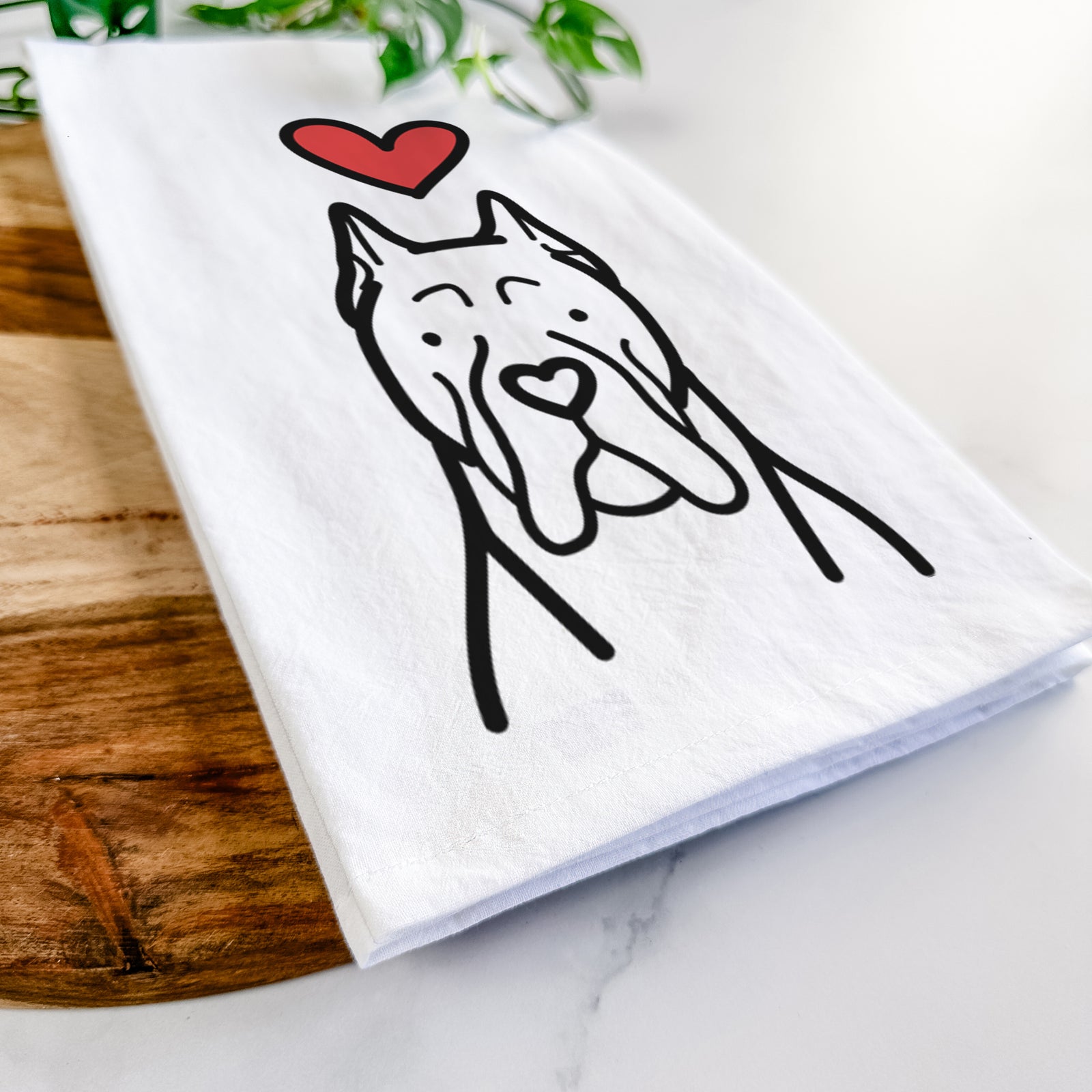 Minimalist line drawing of a CaneCorso with a red heart on a tea towel