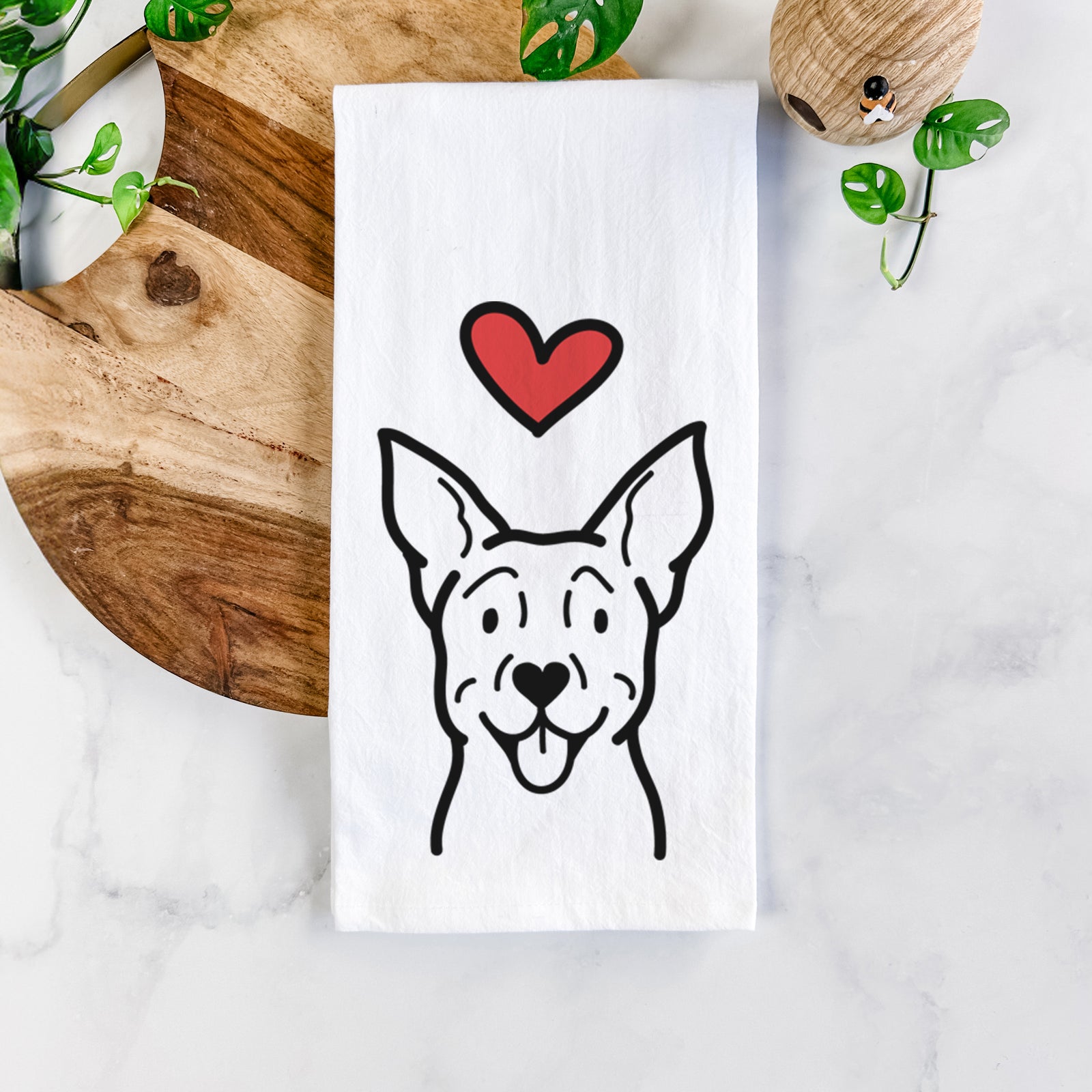 Minimalist line drawing of a Carolina Dog with a red heart on a tea towel
